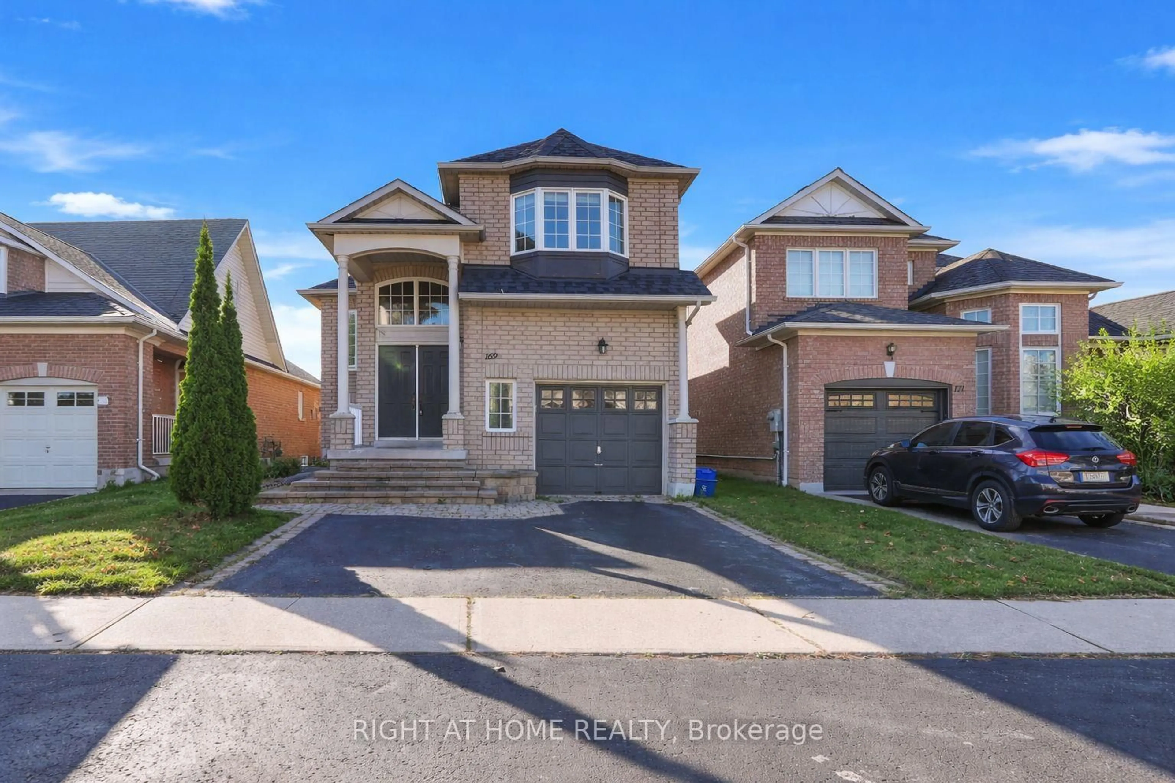 Home with brick exterior material, street for 169 Dooley Cres, Ajax Ontario L1T 4J7