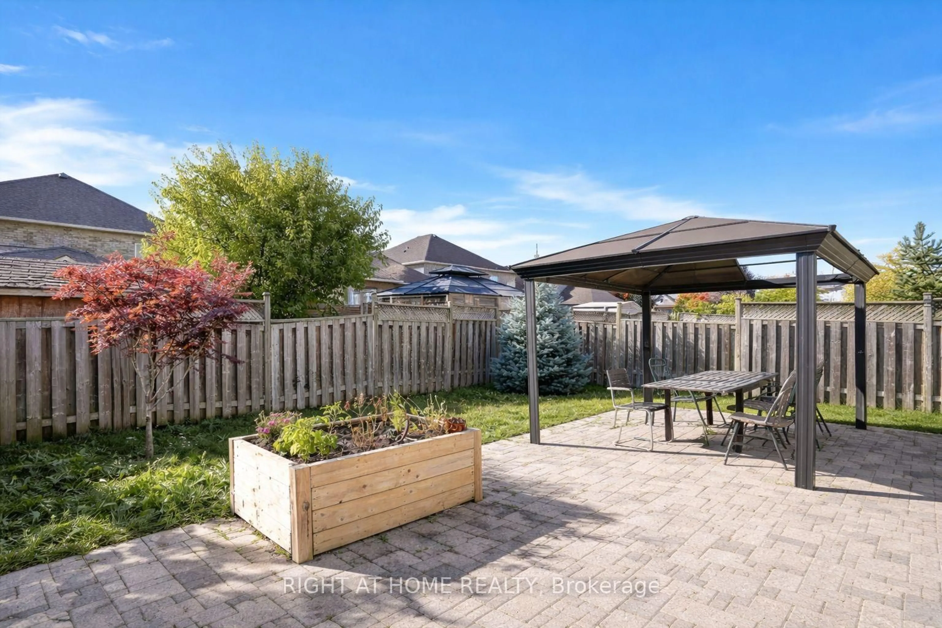 Patio, street for 169 Dooley Cres, Ajax Ontario L1T 4J7