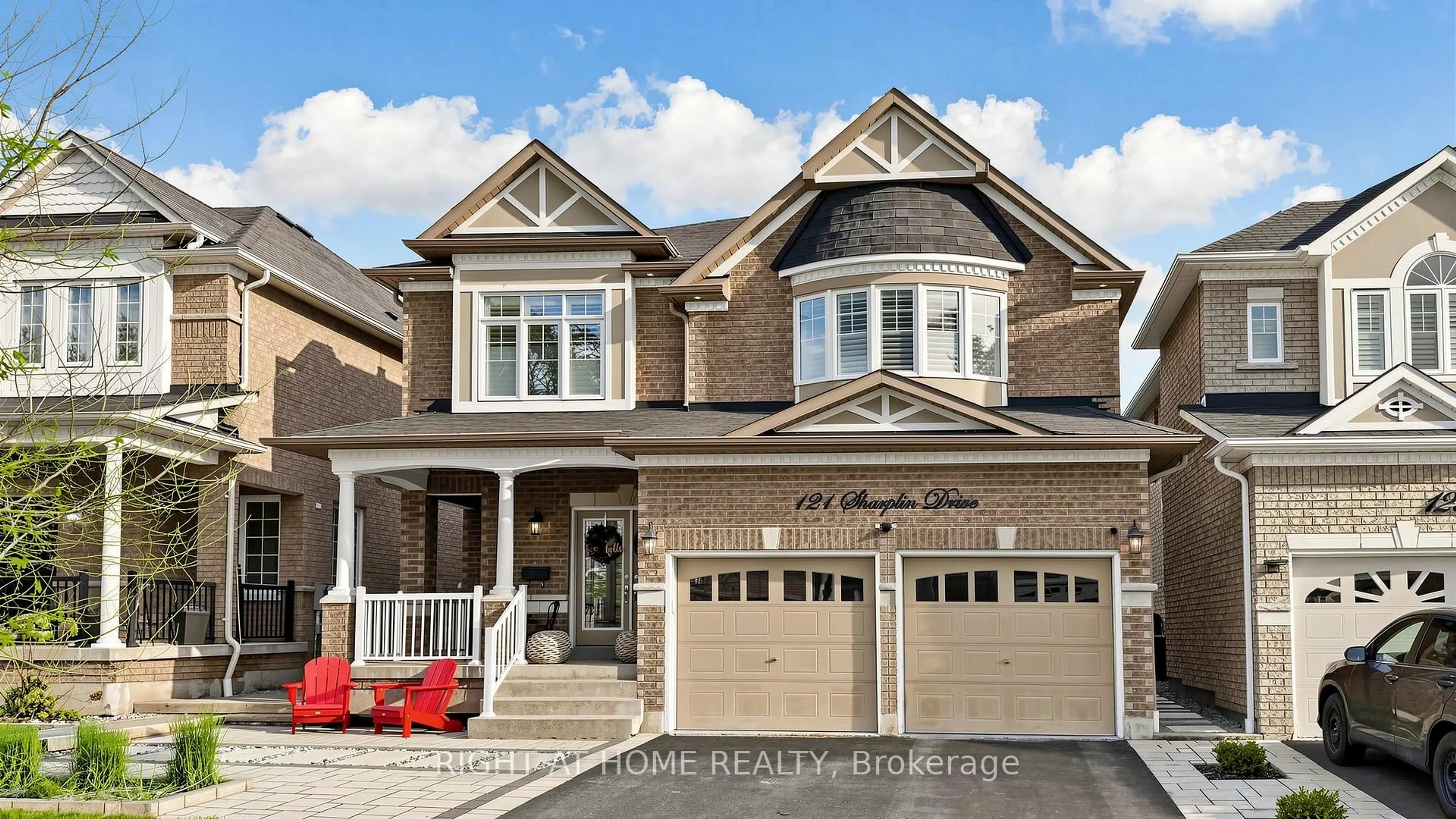 Home with brick exterior material, street for 121 Sharplin Dr, Ajax Ontario L1Z 0P3