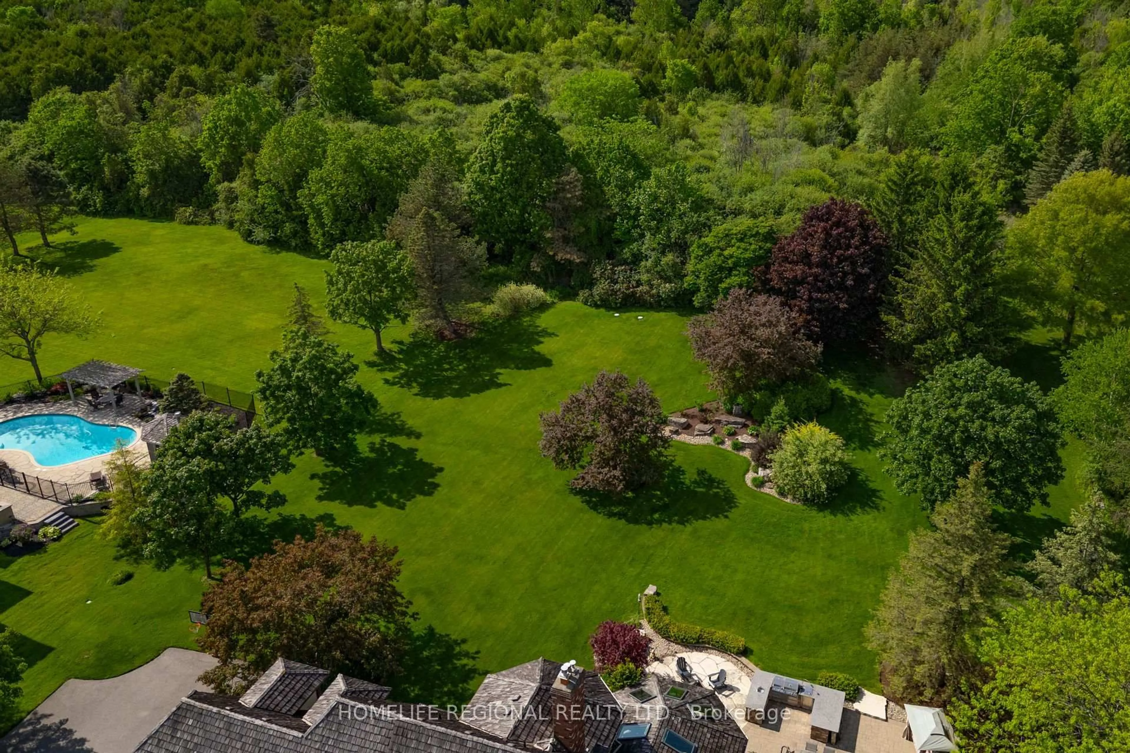 A pic from outside/outdoor area/front of a property/back of a property/a pic from drone, forest/trees view for 14 Buggey Lane, Ajax Ontario L1Z 1X4