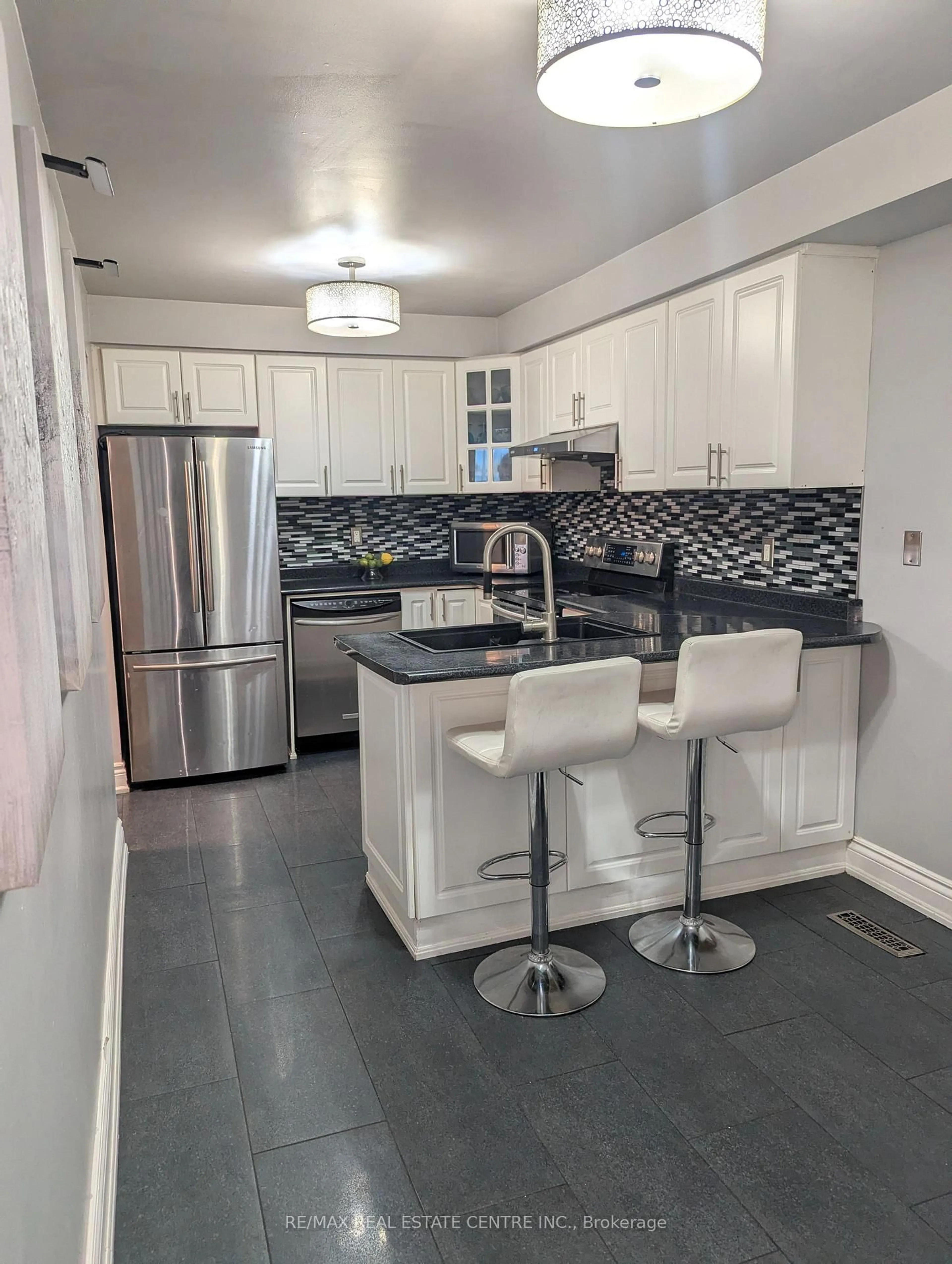 Open concept kitchen, ceramic/tile floor for 130 Wright Cres, Ajax Ontario L1S 6X7