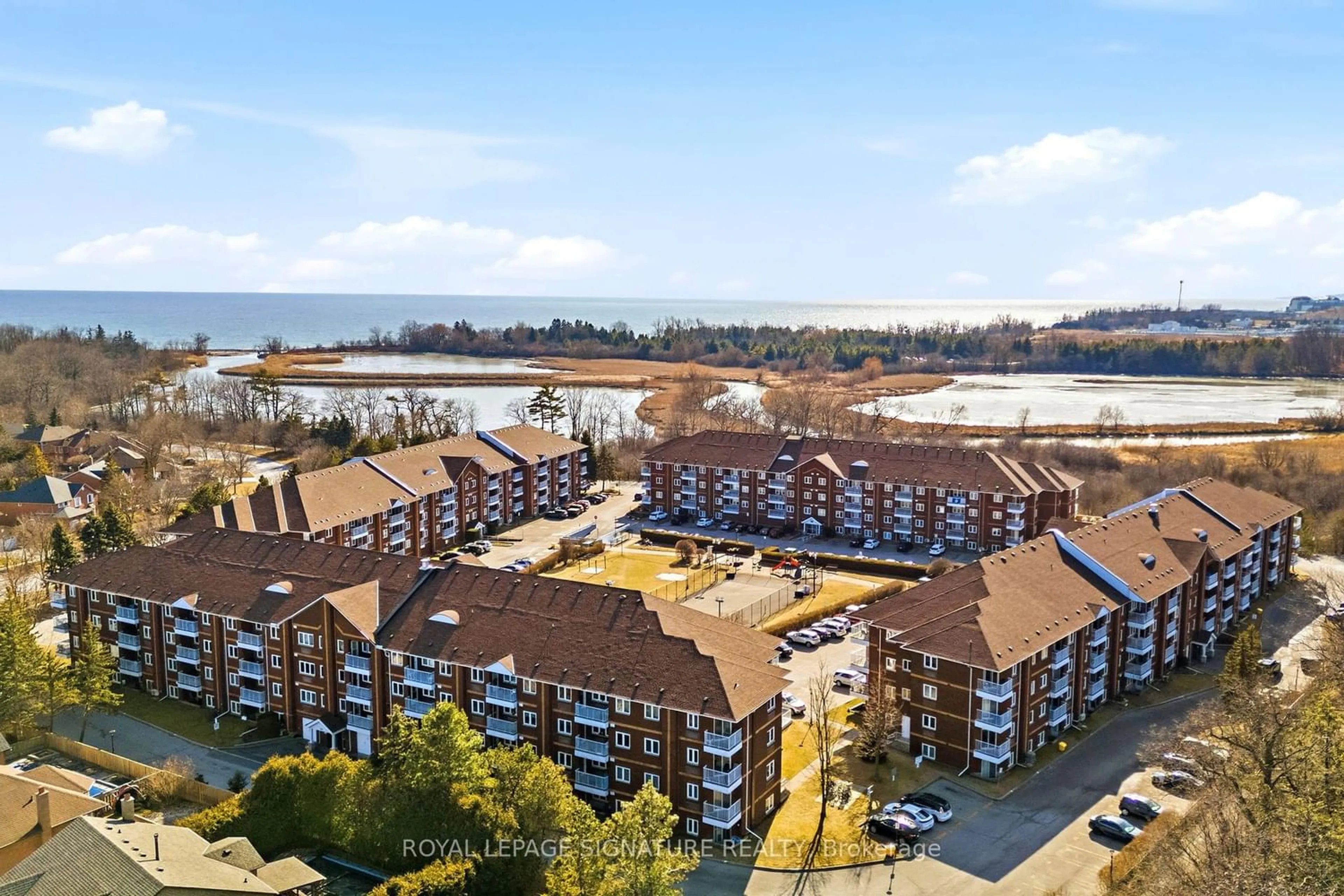 A pic from outside/outdoor area/front of a property/back of a property/a pic from drone, water/lake/river/ocean view for 189 Lake Driveway #217, Ajax Ontario L1S 7J1