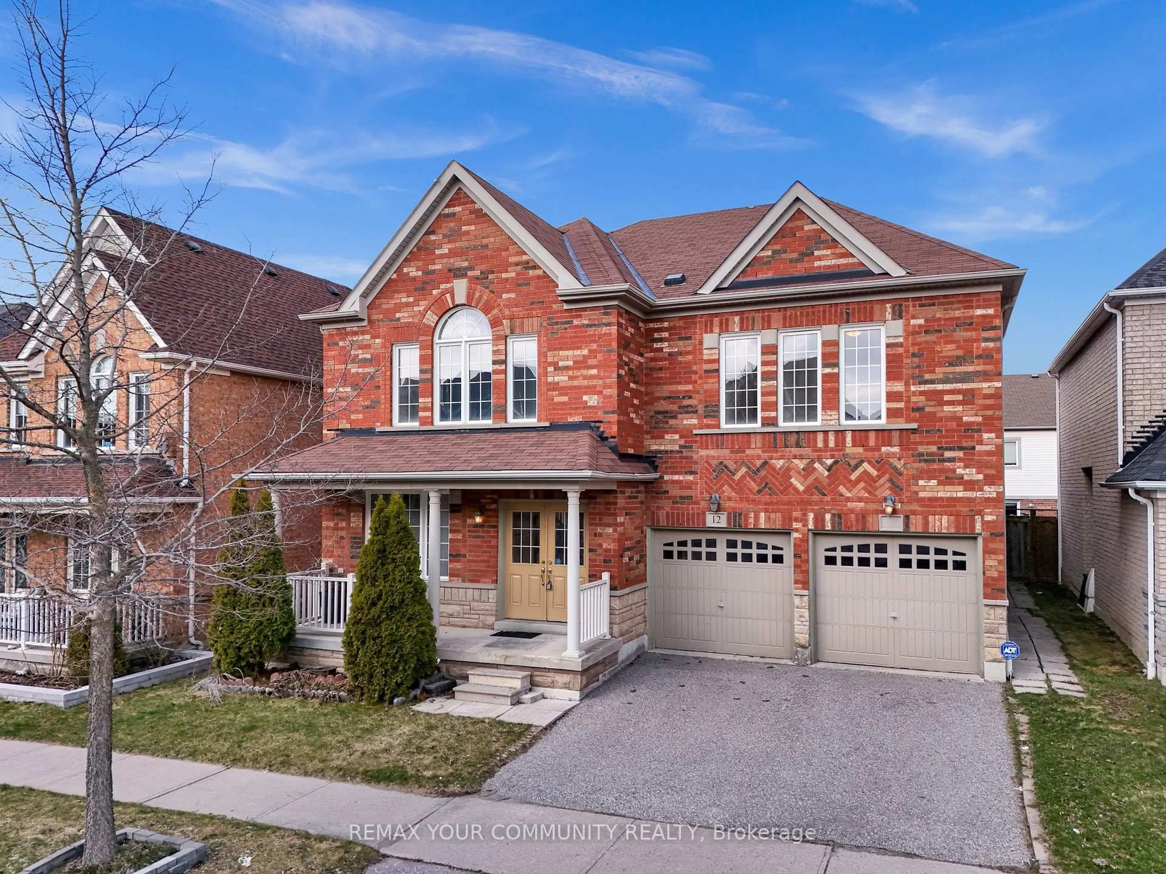 Home with brick exterior material, street for 12 Warburton Dr, Ajax Ontario L1T 0K6