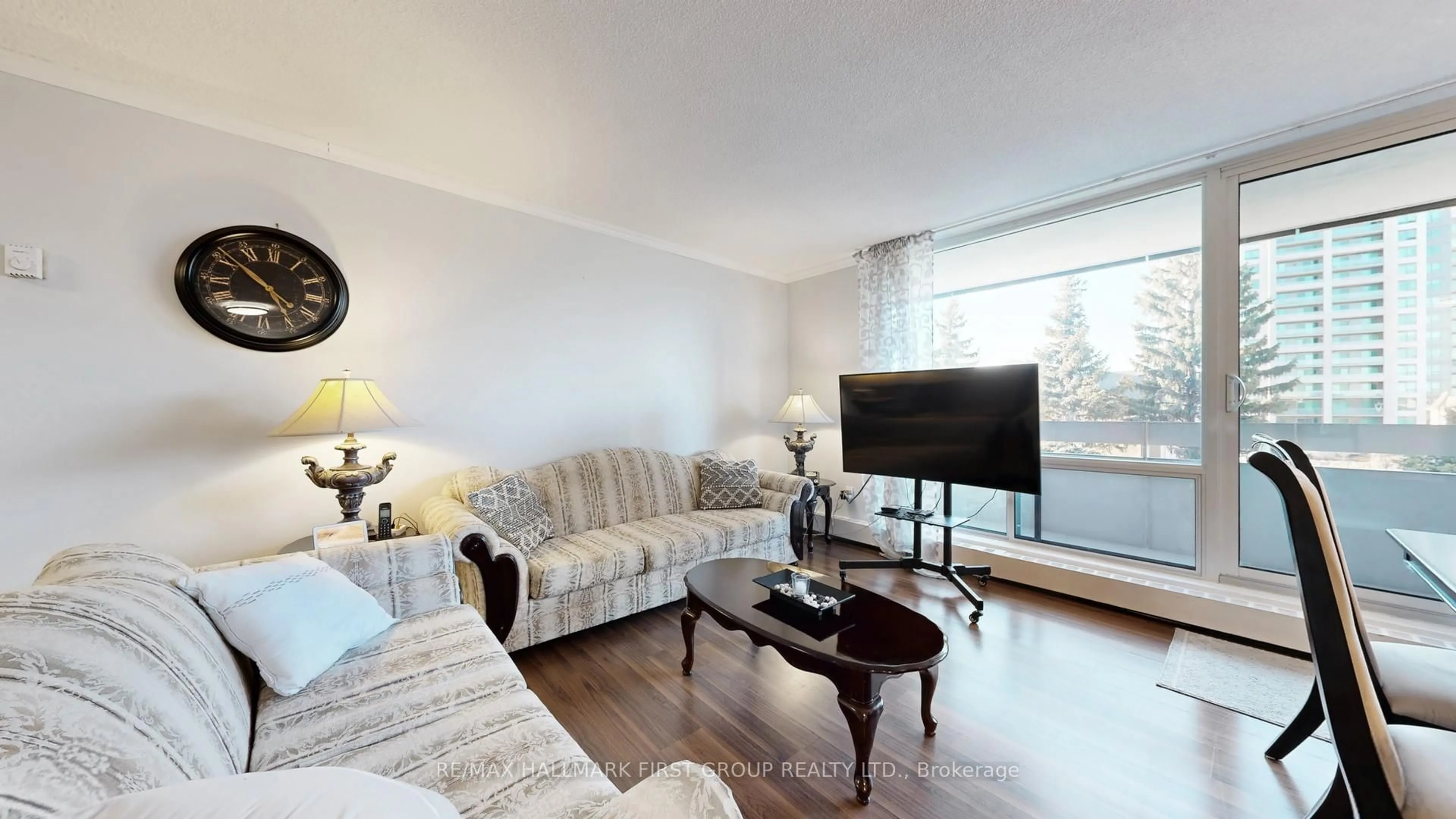 Living room with furniture, wood/laminate floor for 1210 Radom St #509, Pickering Ontario L1W 2Z3