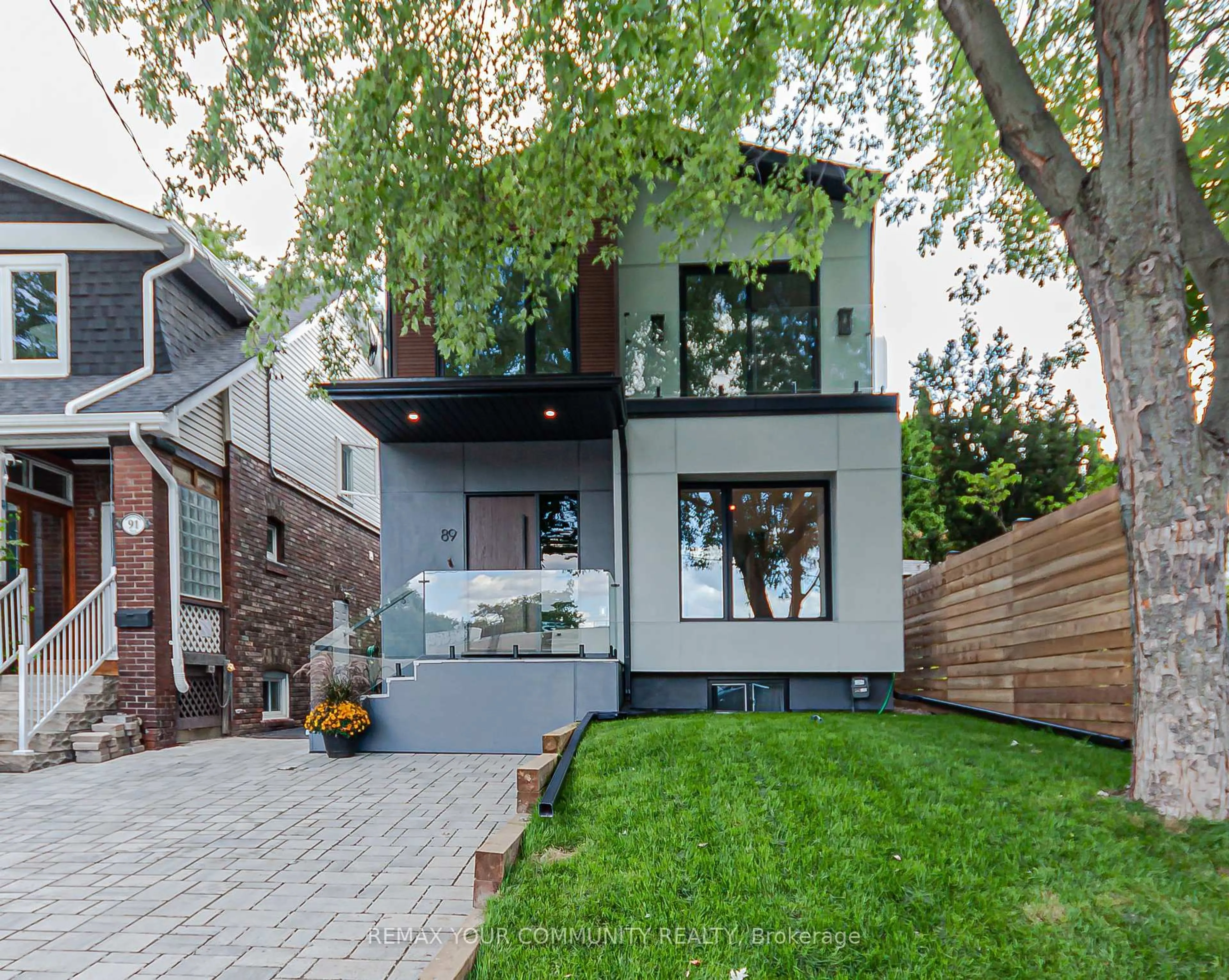 Home with brick exterior material, street for 89 Gainsborough Rd, Toronto Ontario M4L 3C3