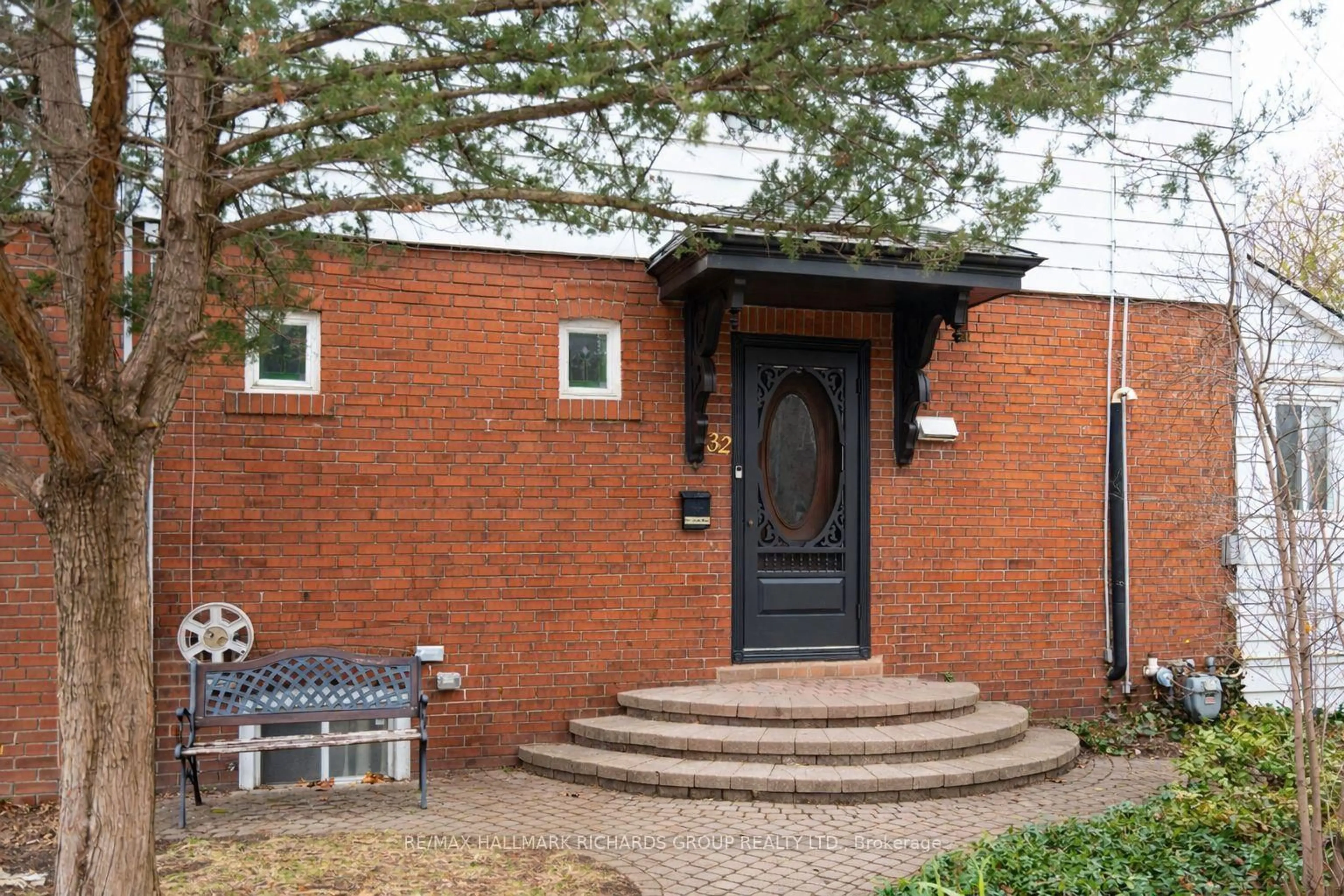 Home with brick exterior material, street for 32 Costain Ave, Toronto Ontario M4E 2G6