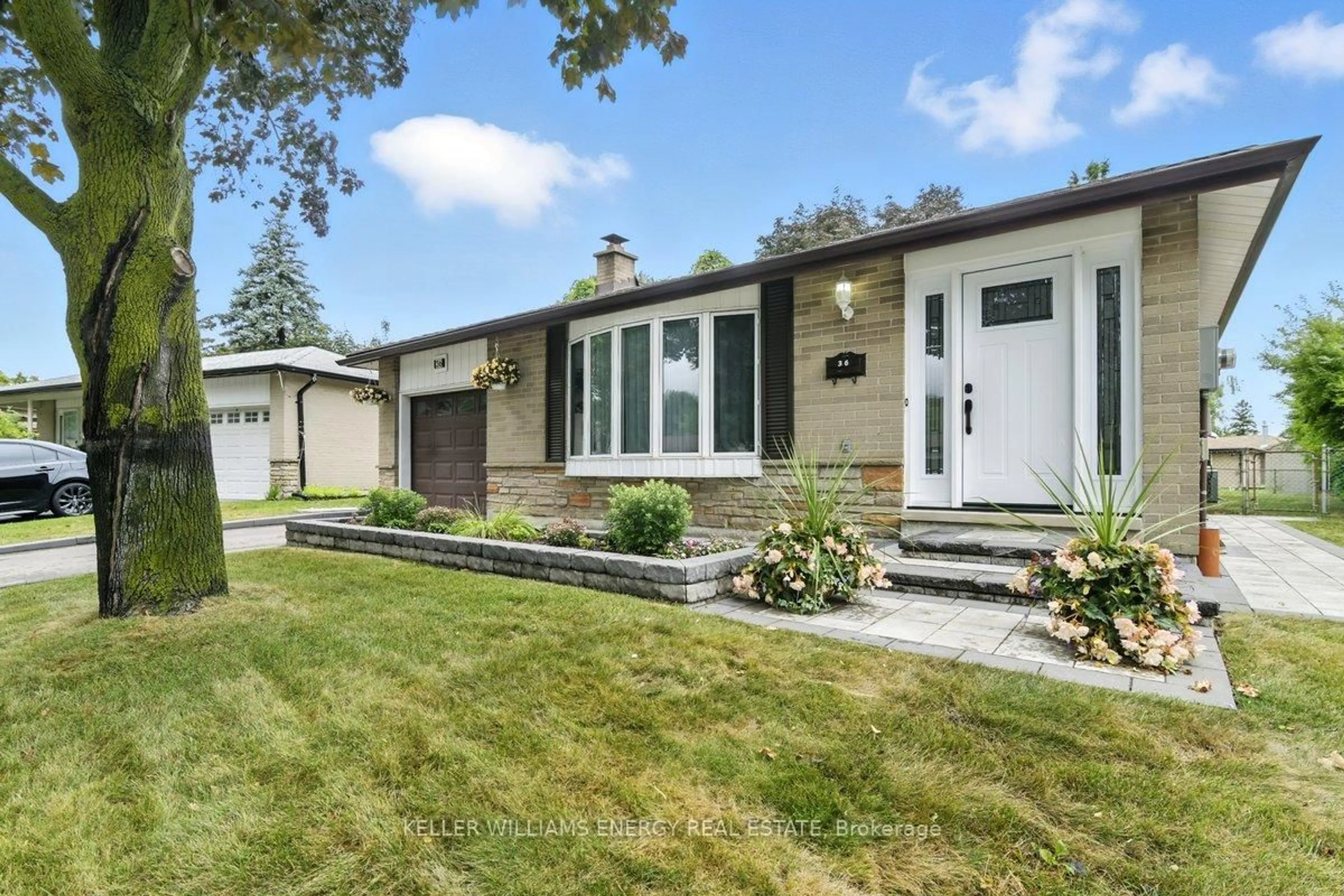 Home with brick exterior material, street for 36 Stonefield Cres, Toronto Ontario M1E 4J5