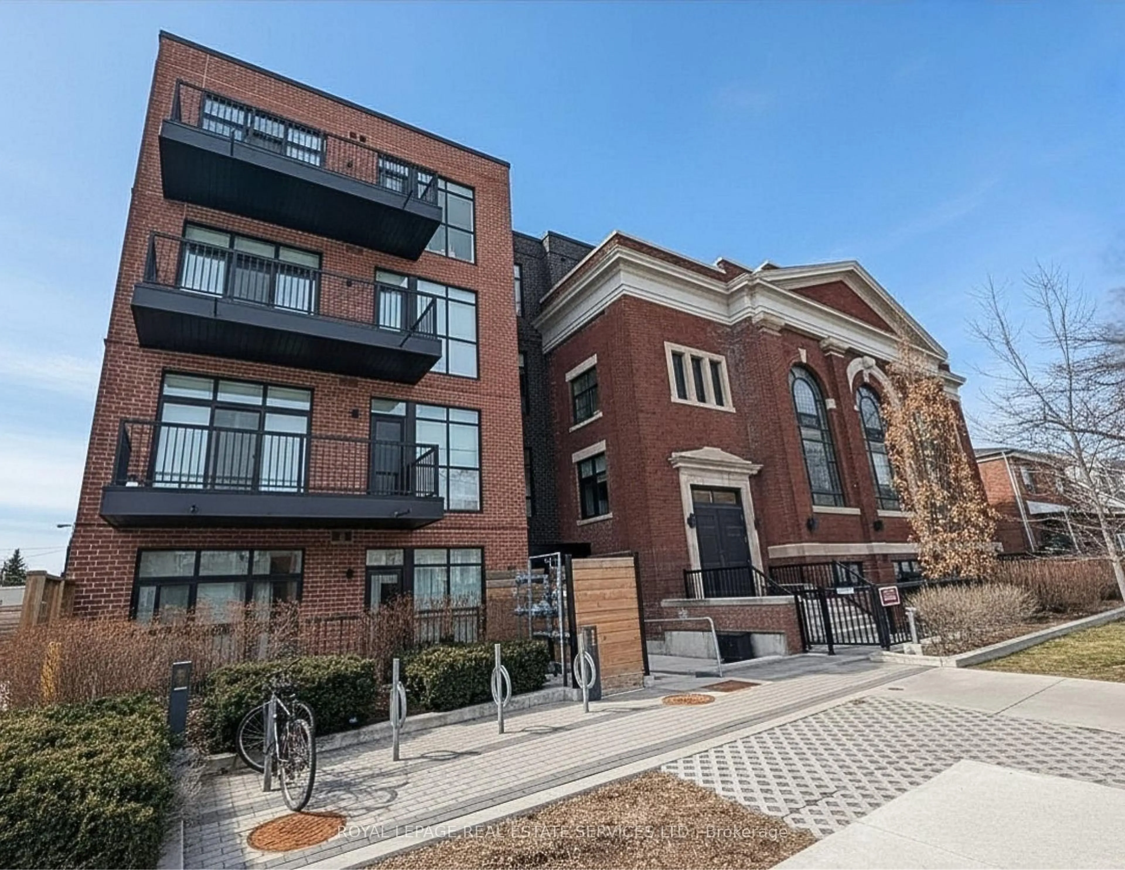 Home with brick exterior material, street for 14 Dewhurst Blvd #101, Toronto Ontario M4J 3H9