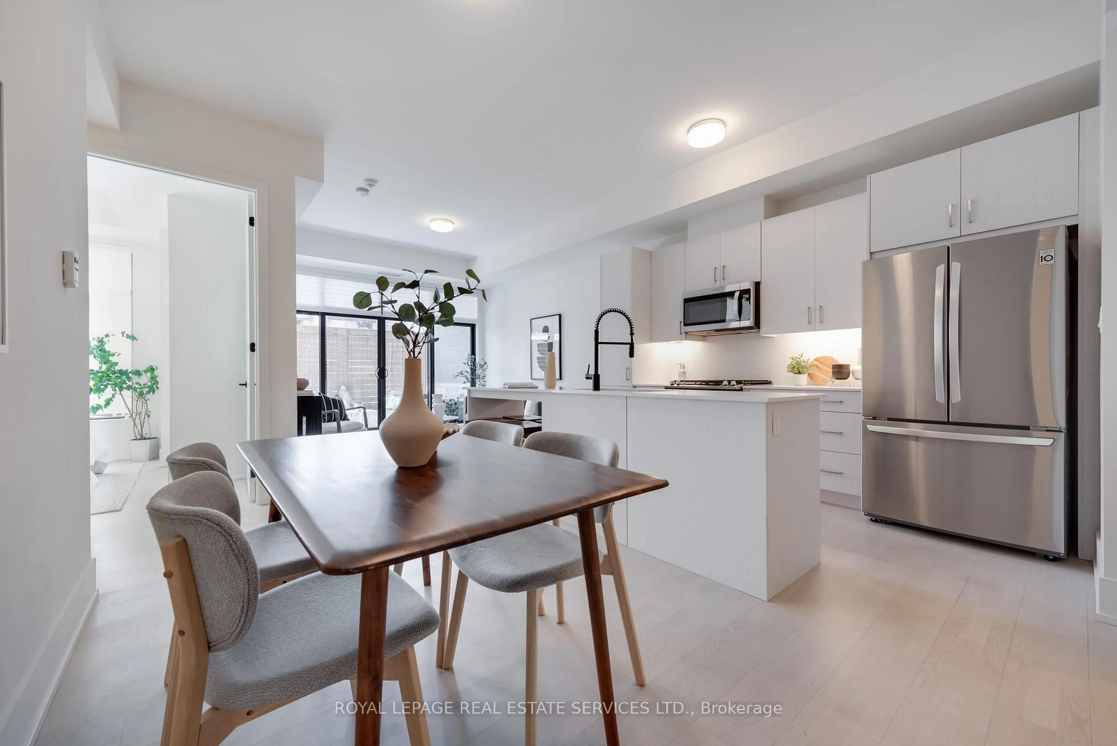 Open concept kitchen, unknown for 14 Dewhurst Blvd #101, Toronto Ontario M4J 3H9