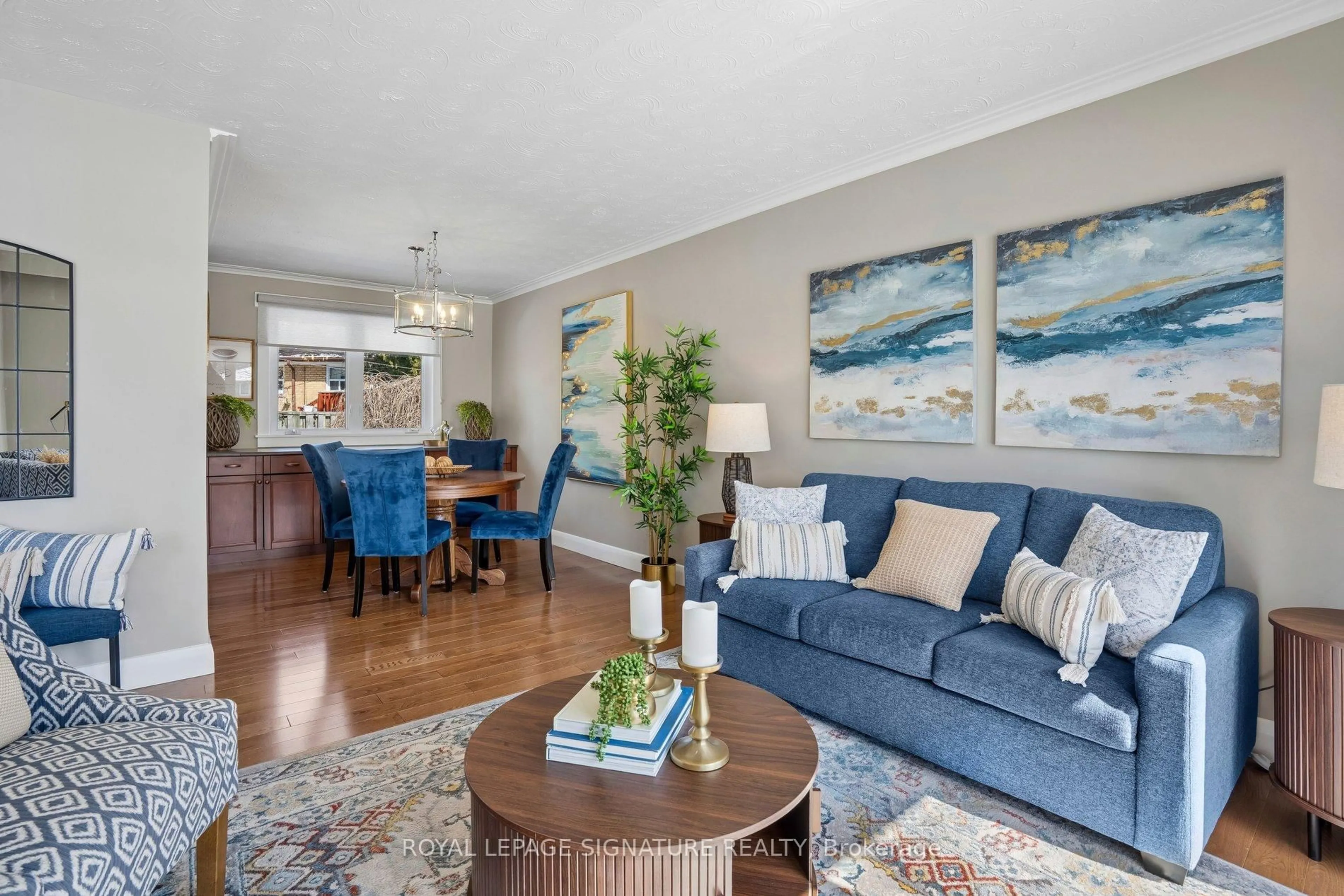 Living room with furniture, wood/laminate floor for 90 Woodgarden Cres, Toronto Ontario M1E 3K2