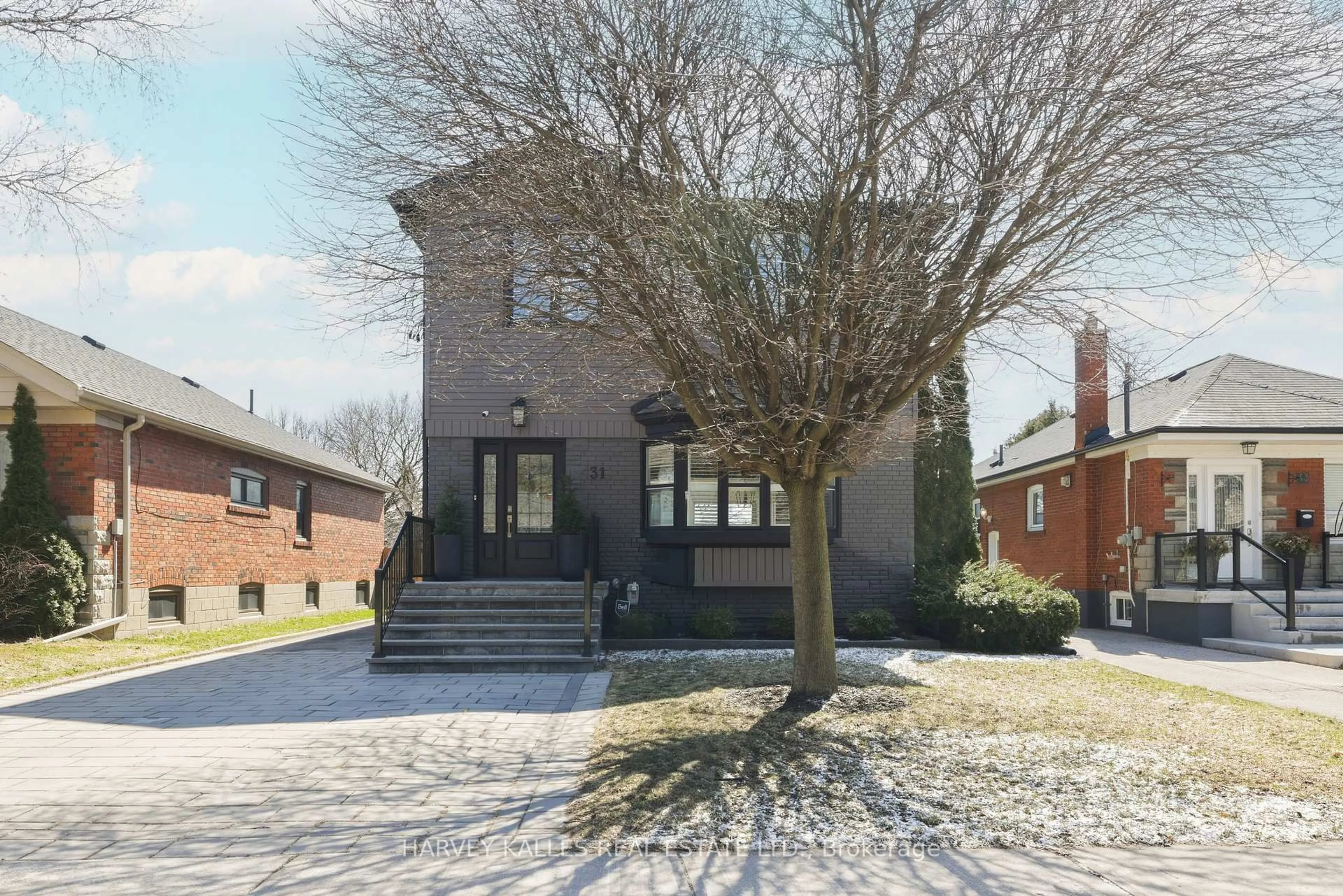 Home with brick exterior material, street for 31 Ferris Rd, Toronto Ontario M4B 1G2