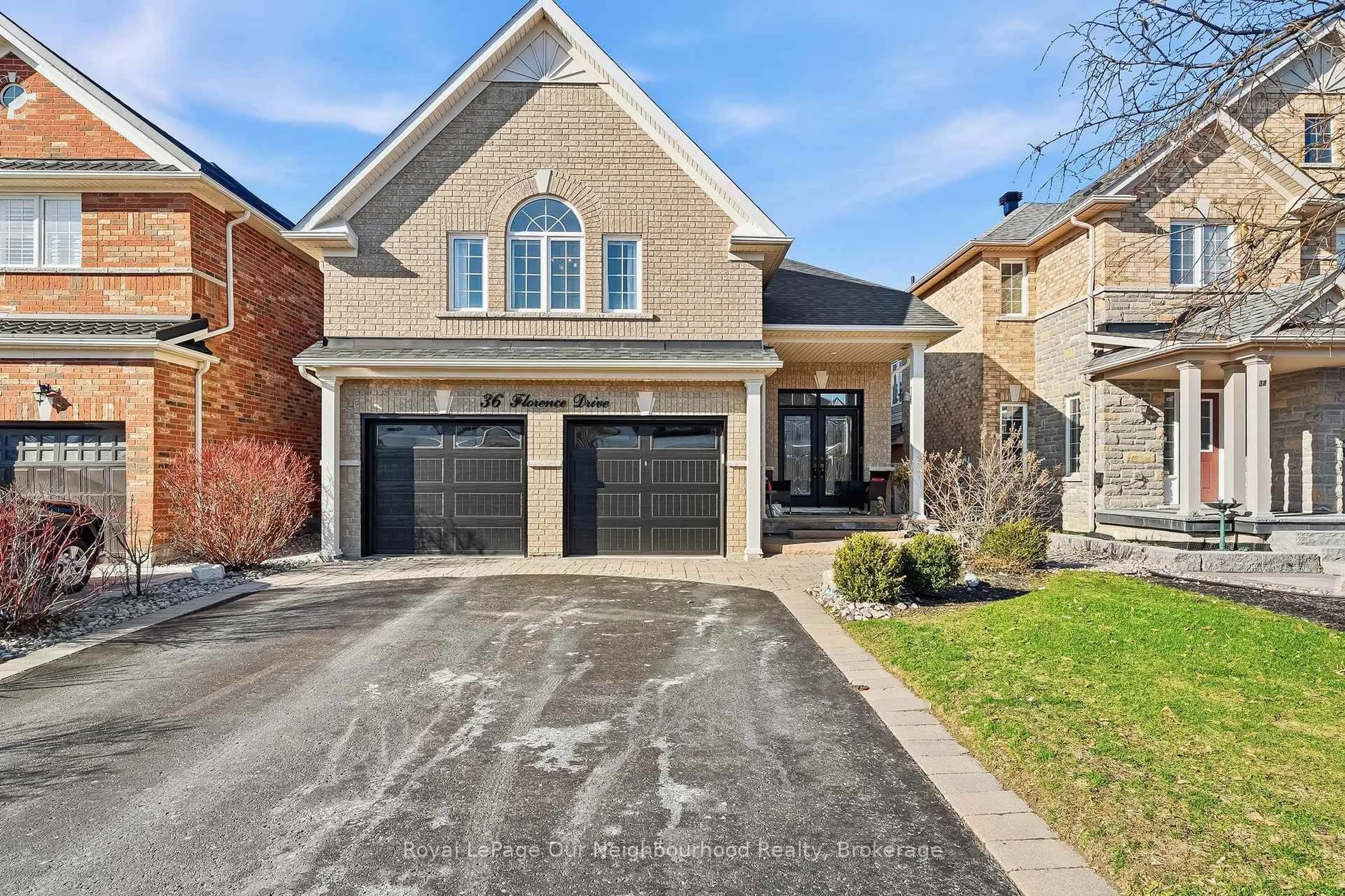 Home with brick exterior material, street for 36 Florence Dr, Whitby Ontario L1R 0K2