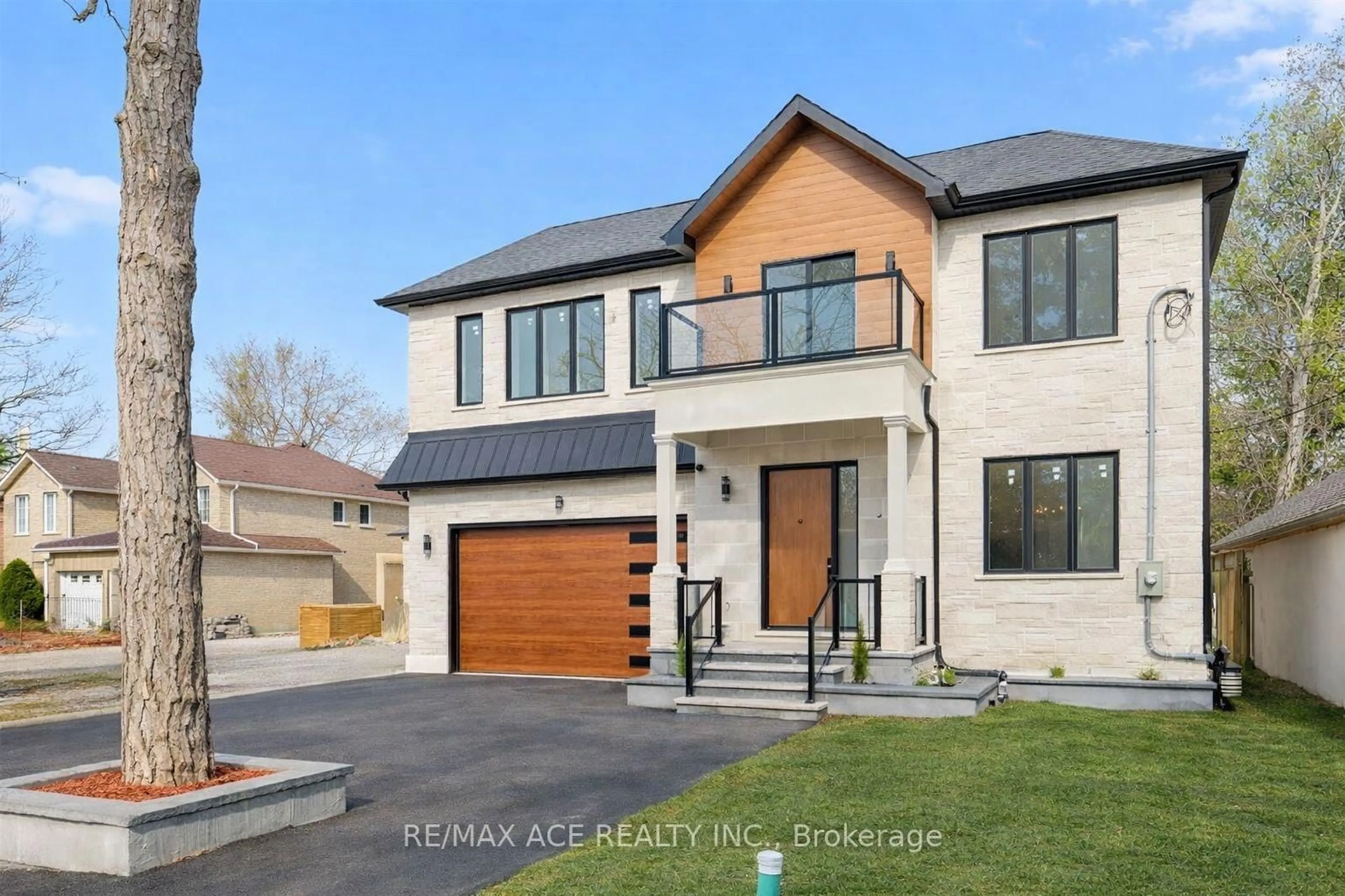 Home with brick exterior material, street for 5 Larwood Blvd, Toronto Ontario M1M 2M5