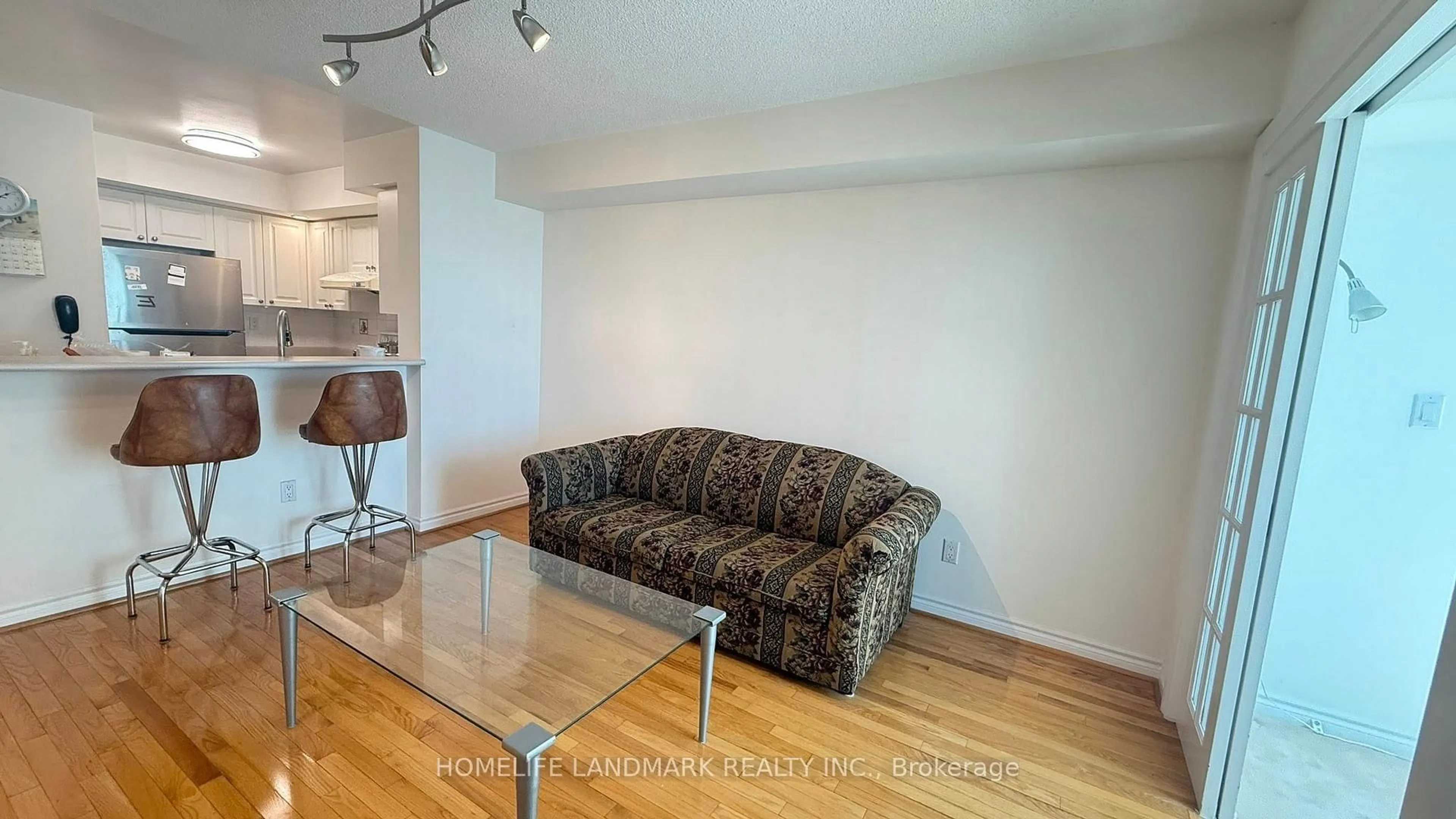 Living room with furniture, wood/laminate floor for 123 Omni Dr #964, Toronto Ontario M1P 5A8