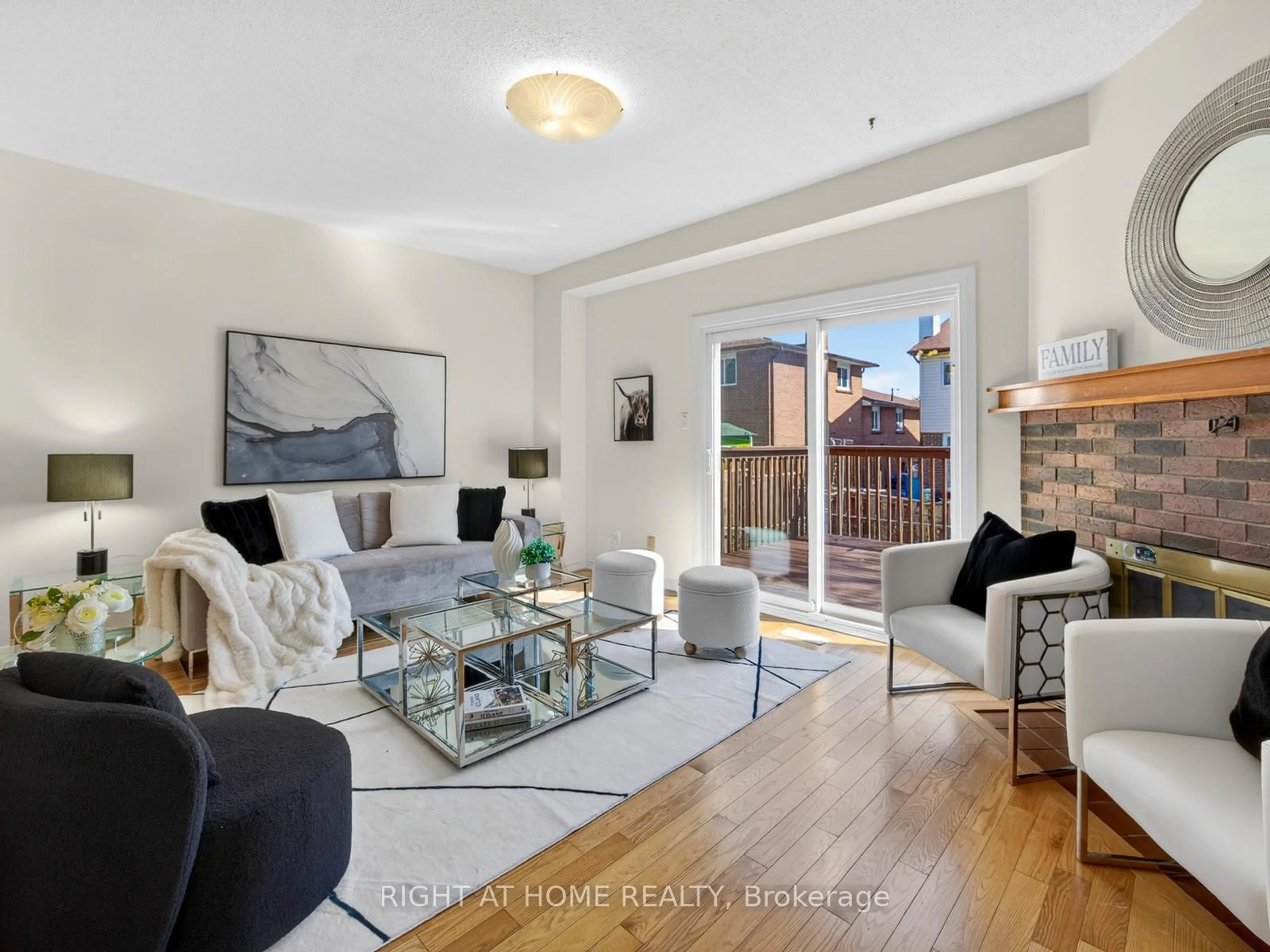 Living room with furniture, wood/laminate floor for 54 Lady Churchill Crt, Toronto Ontario M1V 2J6