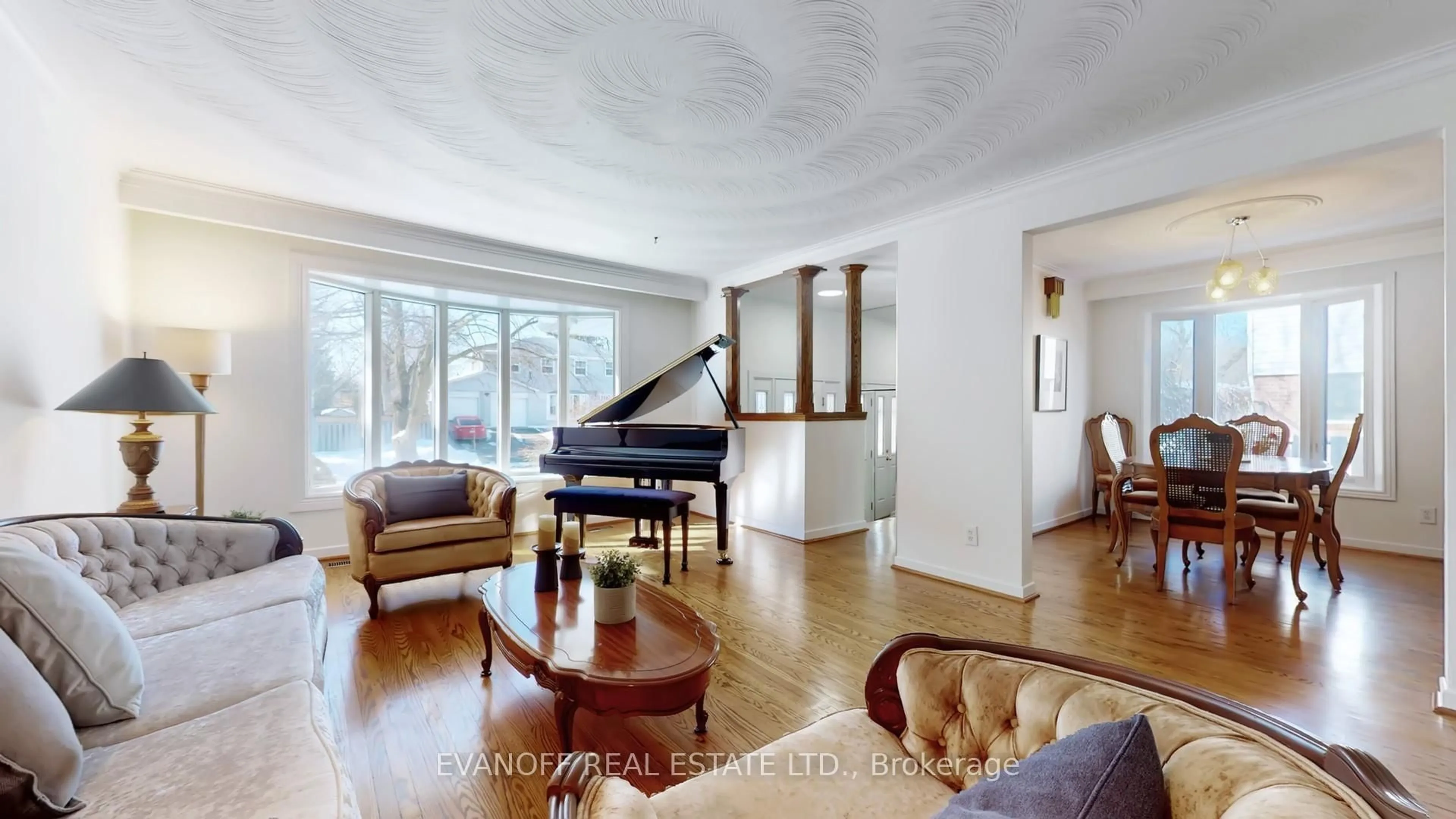 Living room with furniture, wood/laminate floor for 63 South Marine Dr, Toronto Ontario M1E 1A1