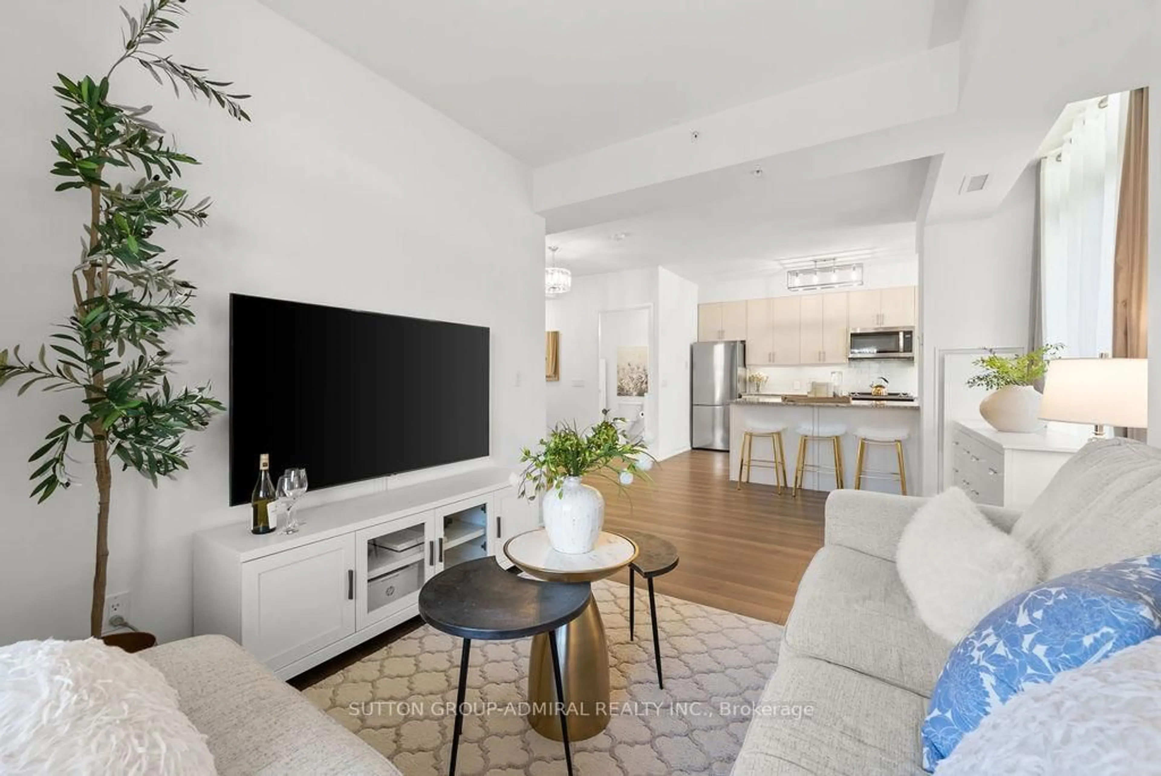 Living room with furniture, unknown for 3655 Kingston Rd #210, Toronto Ontario M1M 0E2