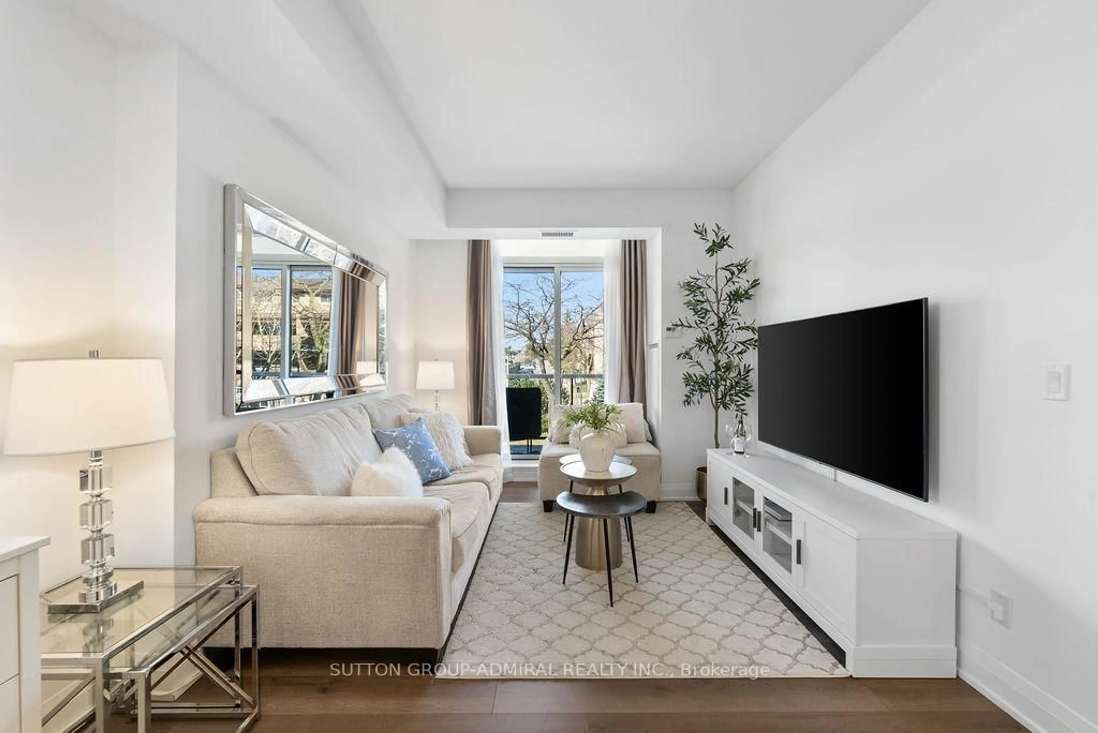 Living room with furniture, unknown for 3655 Kingston Rd #210, Toronto Ontario M1M 0E2