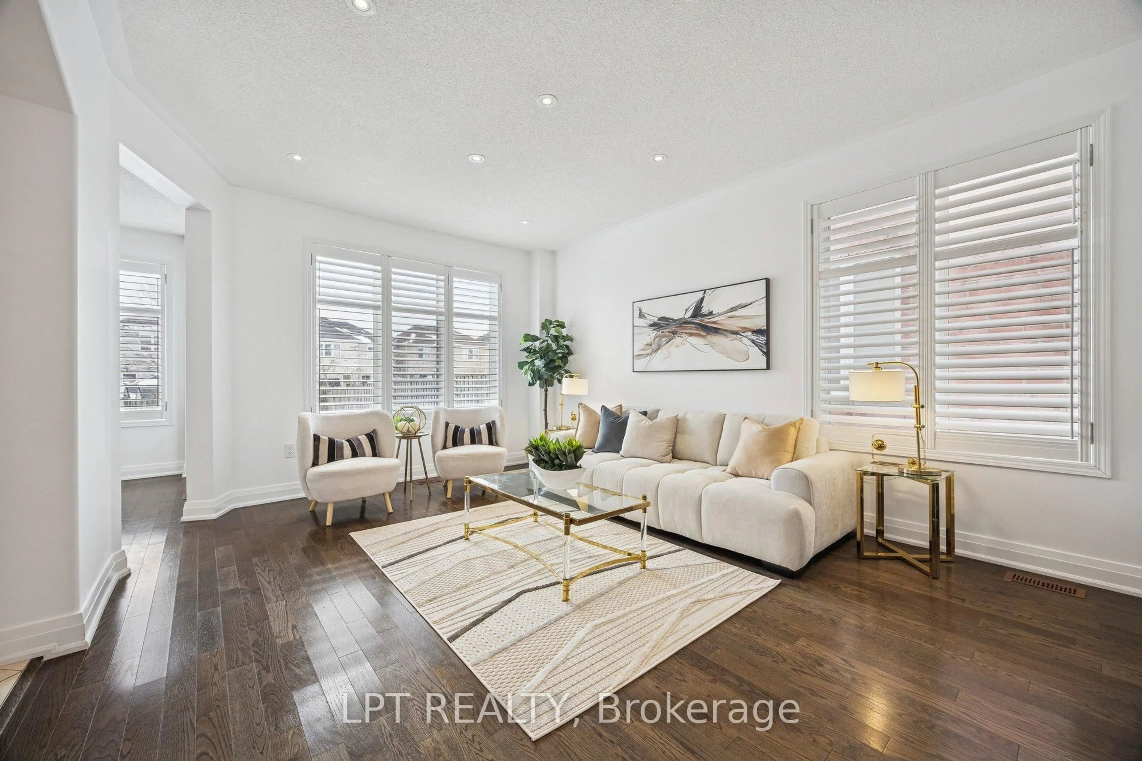 Living room with furniture, wood/laminate floor for 61 Minerva Ave, Toronto Ontario M1M 0C2