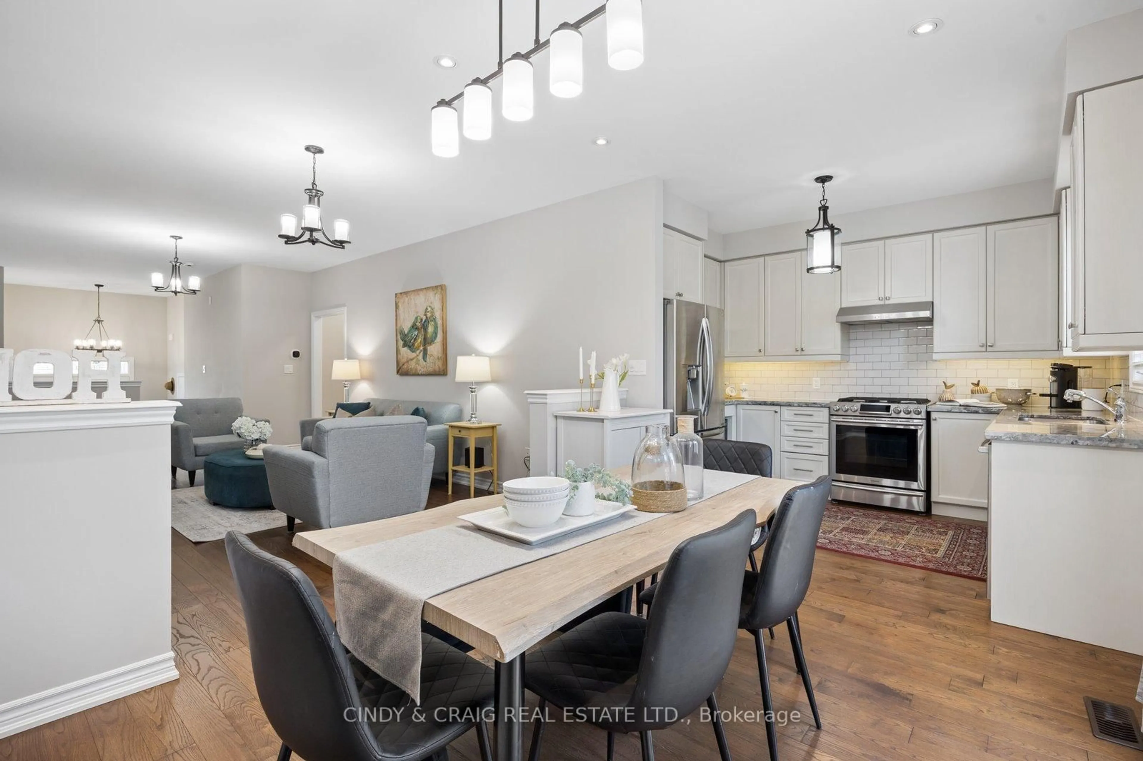 Open concept kitchen, wood/laminate floor for 47 Gordon Cowling St, Clarington Ontario L1E 0G7