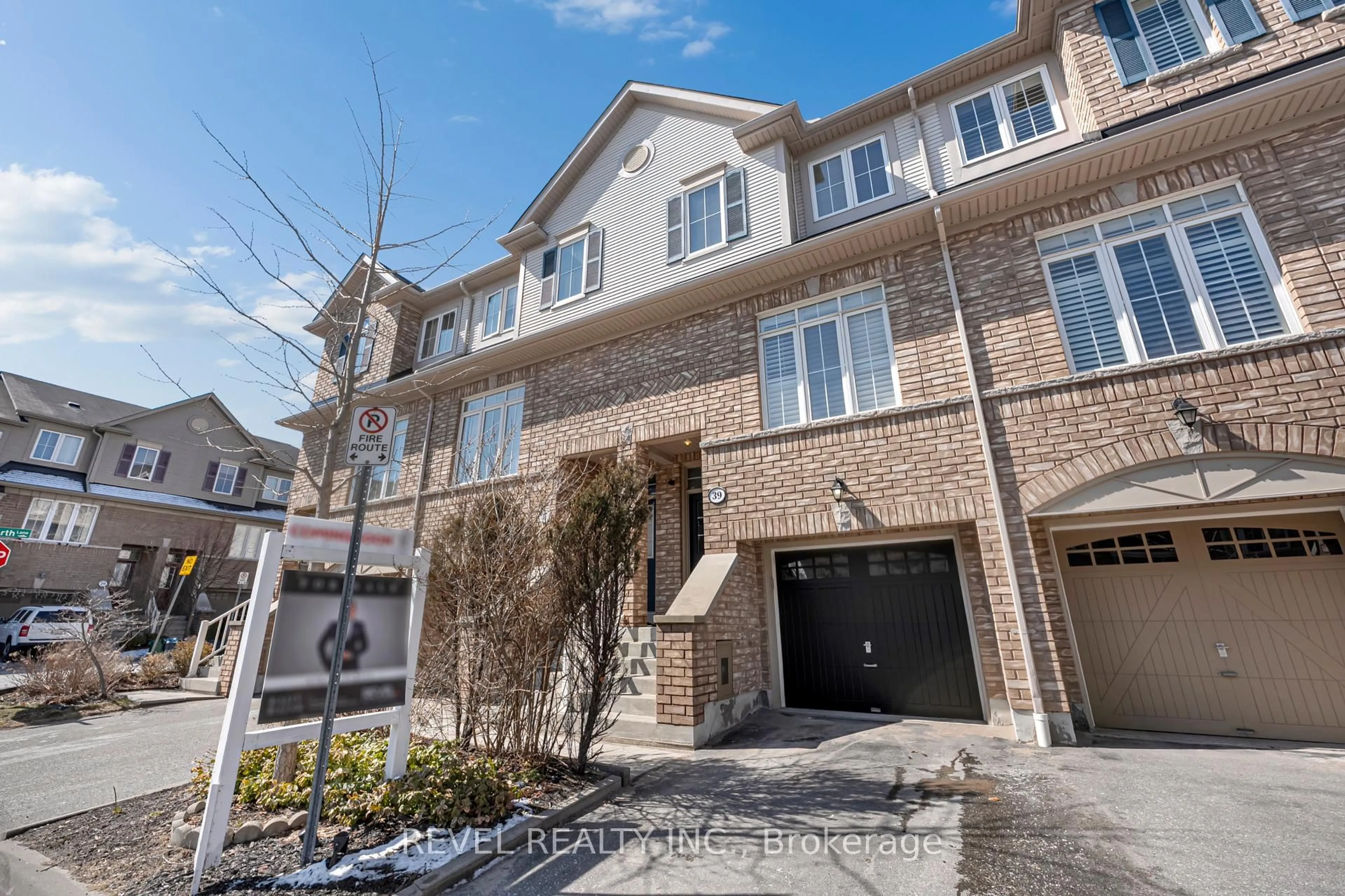 Home with brick exterior material, street for 39 Martinworth Lane, Ajax Ontario L1Z 0L1