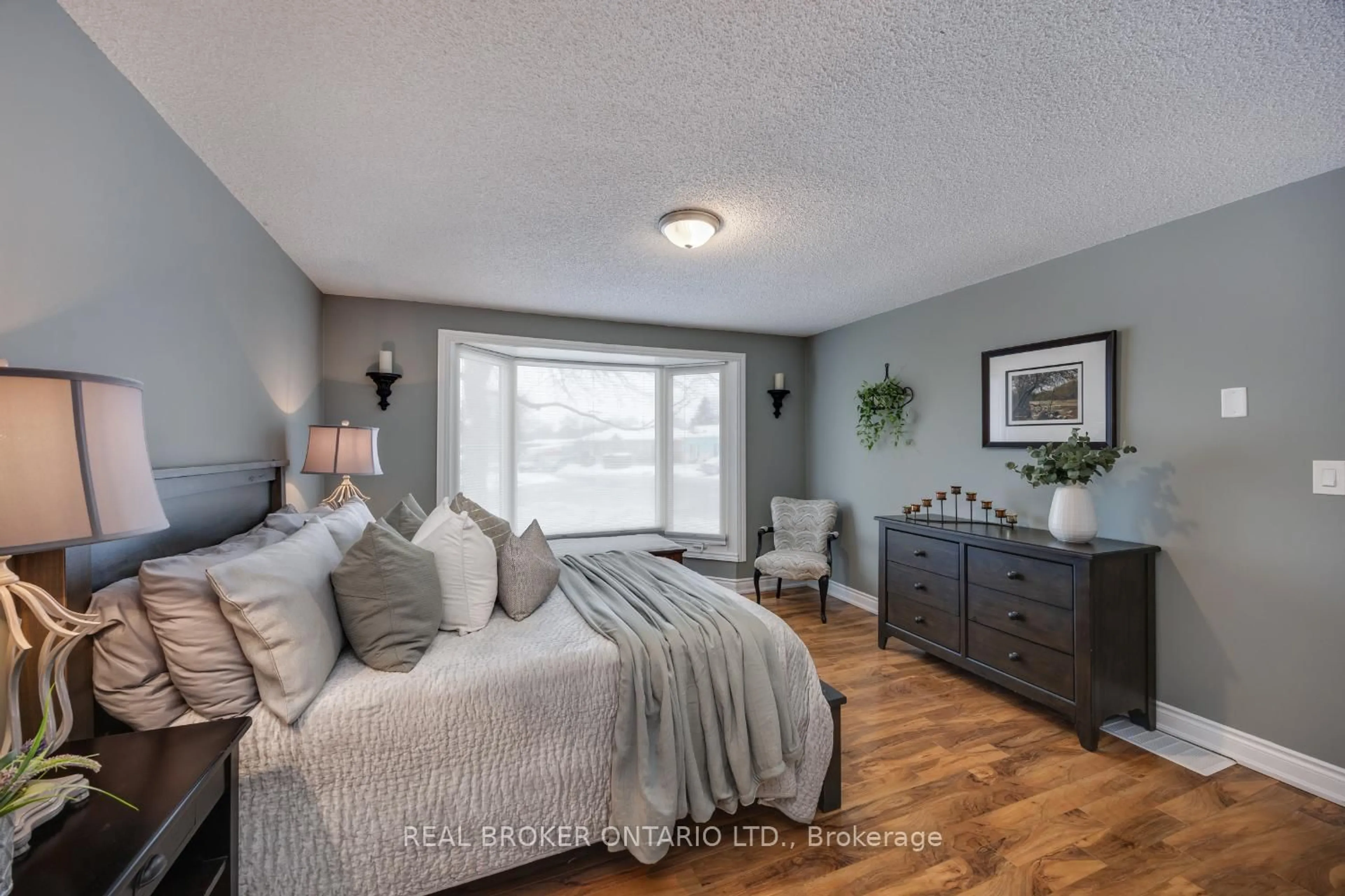 Bedroom with bed, wood/laminate floor for 22 Champlain Crt, Clarington Ontario L1B 1A5