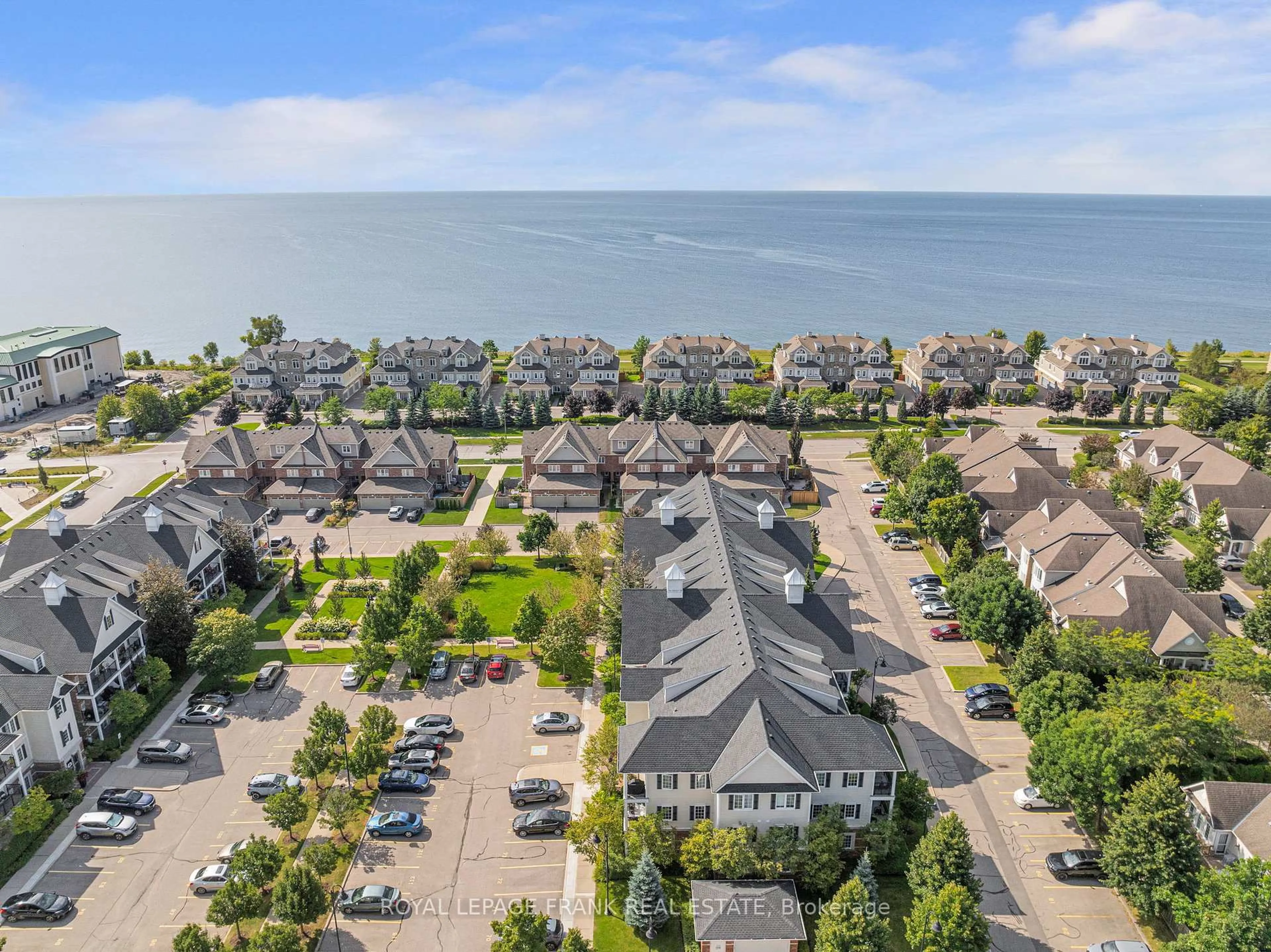 A pic from outside/outdoor area/front of a property/back of a property/a pic from drone, water/lake/river/ocean view for 75 Shipway Ave #301, Clarington Ontario L1B 0B8