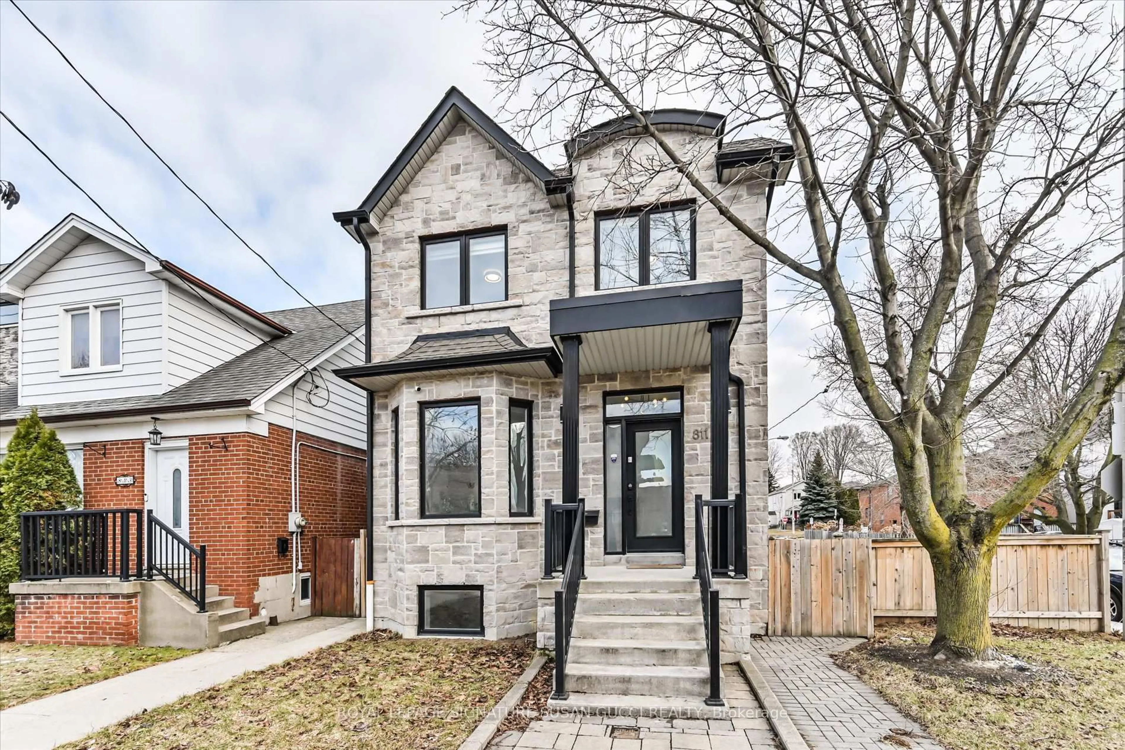 Home with brick exterior material, street for 811 Cosburn Ave, Toronto Ontario M4C 2V9
