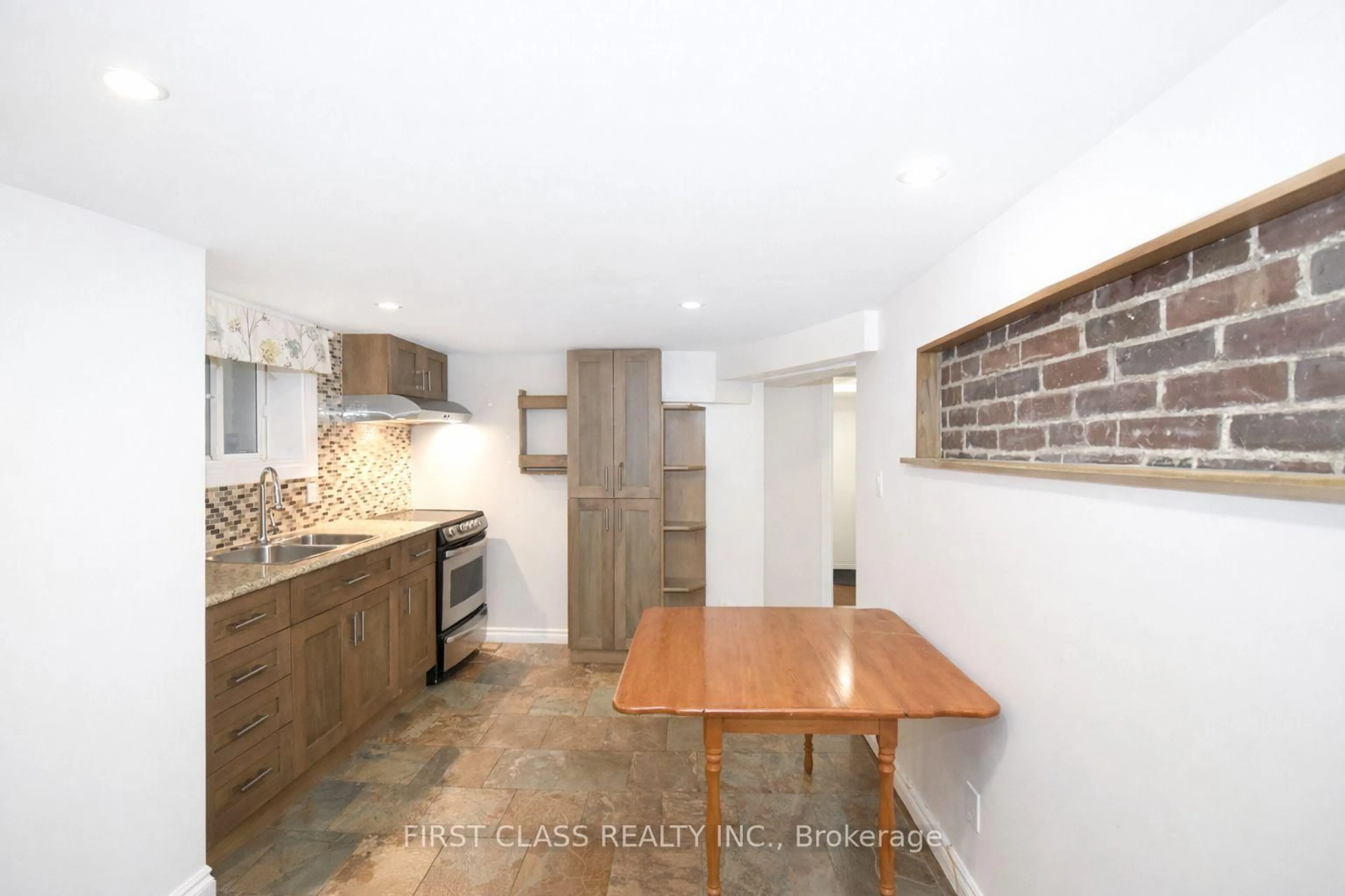 Open concept kitchen, unknown for 102 Greenwood Ave, Toronto Ontario M4L 2P6