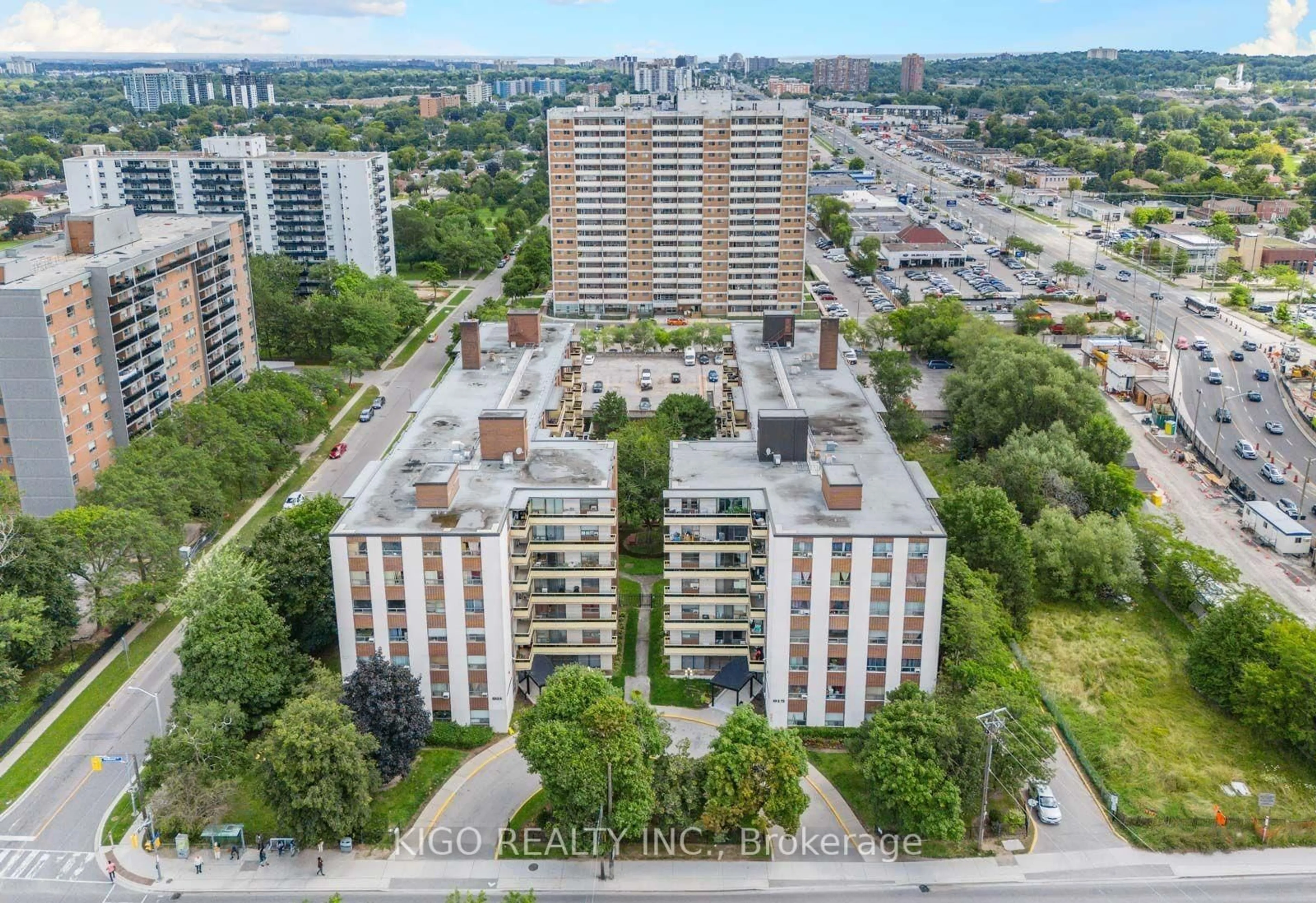 A pic from outside/outdoor area/front of a property/back of a property/a pic from drone, city buildings view from balcony for 915 Midland Ave #210, Toronto Ontario M1K 4G1