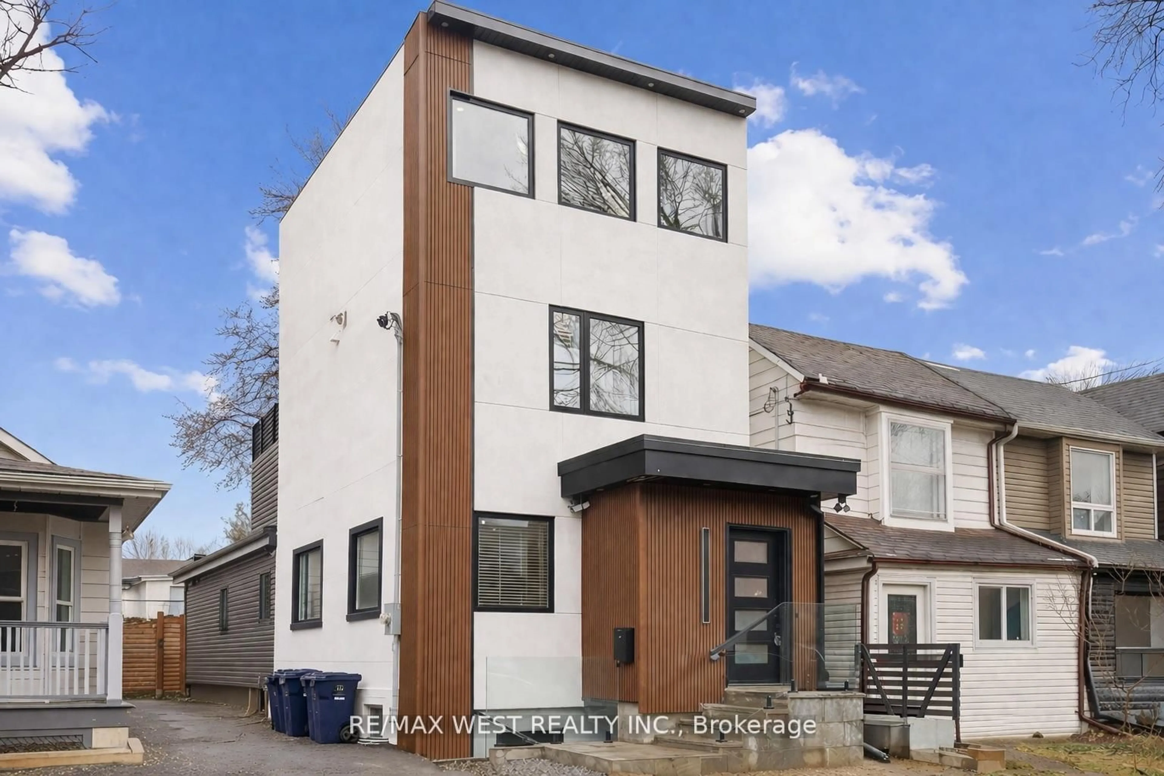 Home with brick exterior material, street for 201 Rhodes Ave, Toronto Ontario M4L 3A2