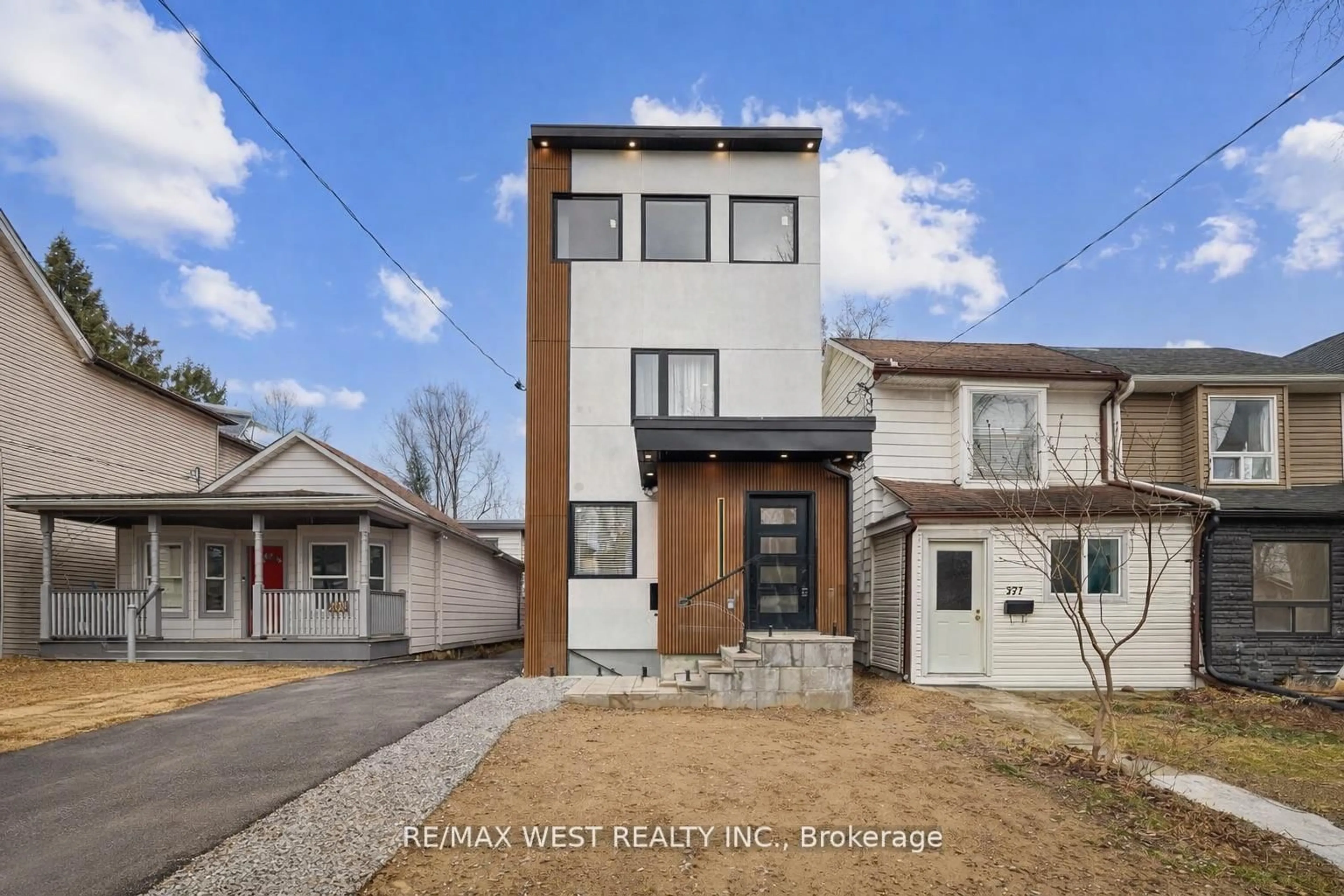 Home with brick exterior material, street for 201 Rhodes Ave, Toronto Ontario M4L 3A2