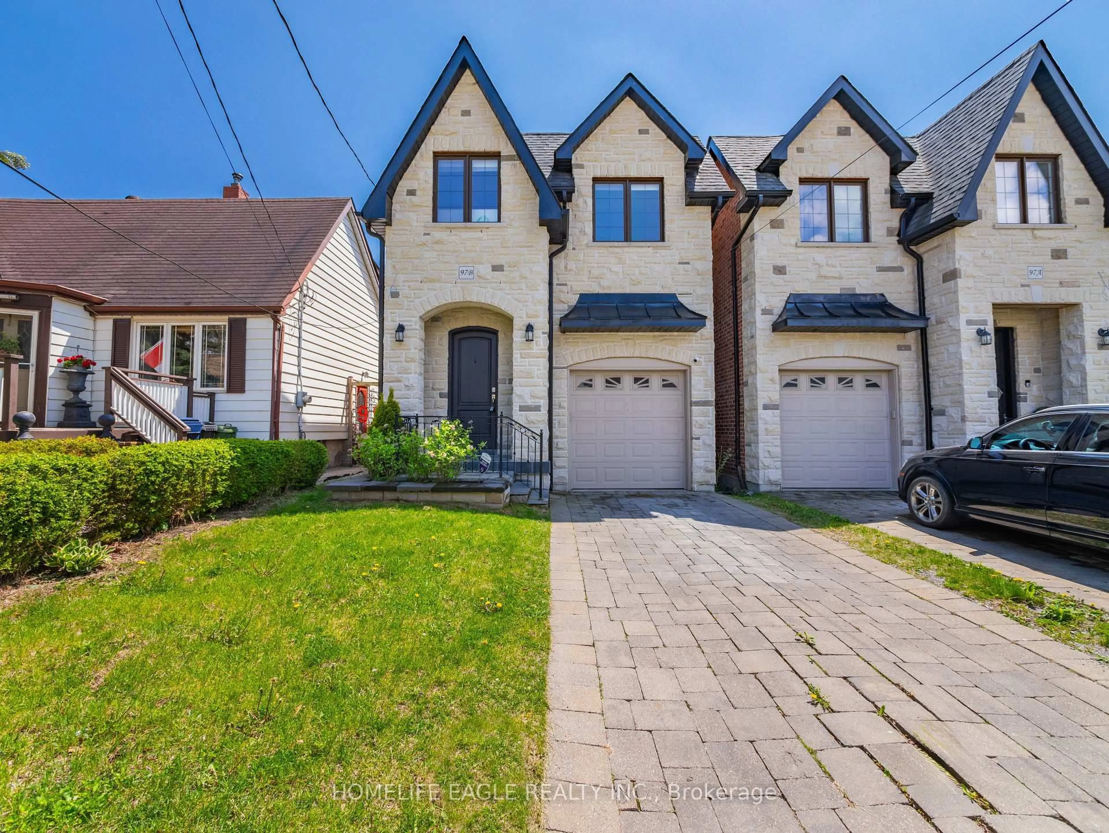 Home with brick exterior material, street for 97B Craiglee Dr, Toronto Ontario M1N 2M8