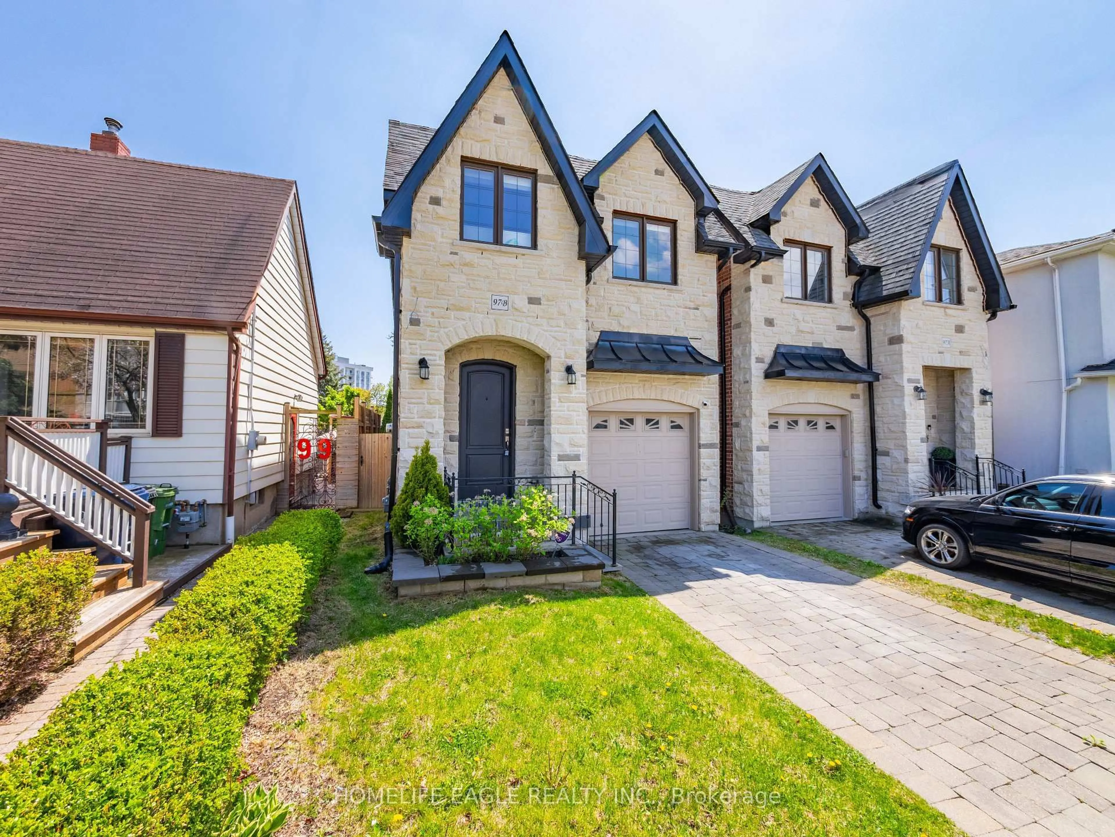 Home with brick exterior material, street for 97B Craiglee Dr, Toronto Ontario M1N 2M8