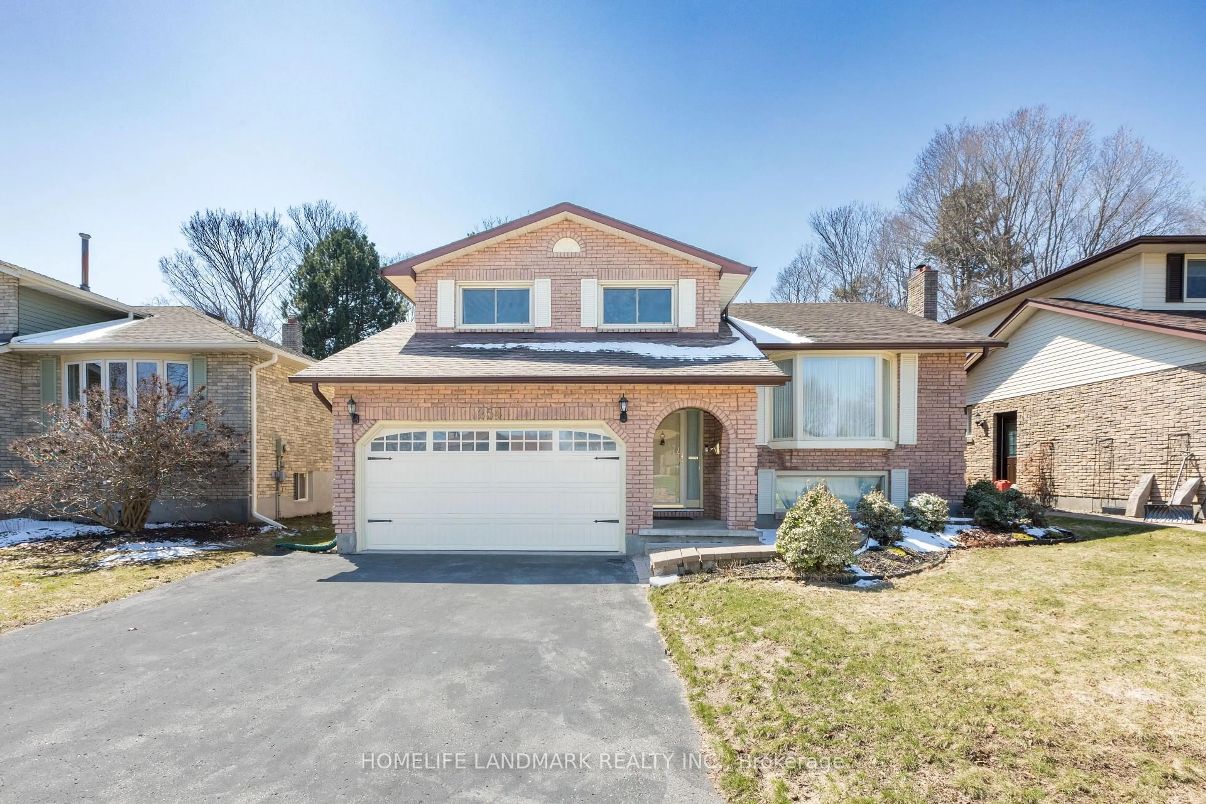 Home with brick exterior material, street for 254 Athabasca St, Oshawa Ontario L1H 8E4