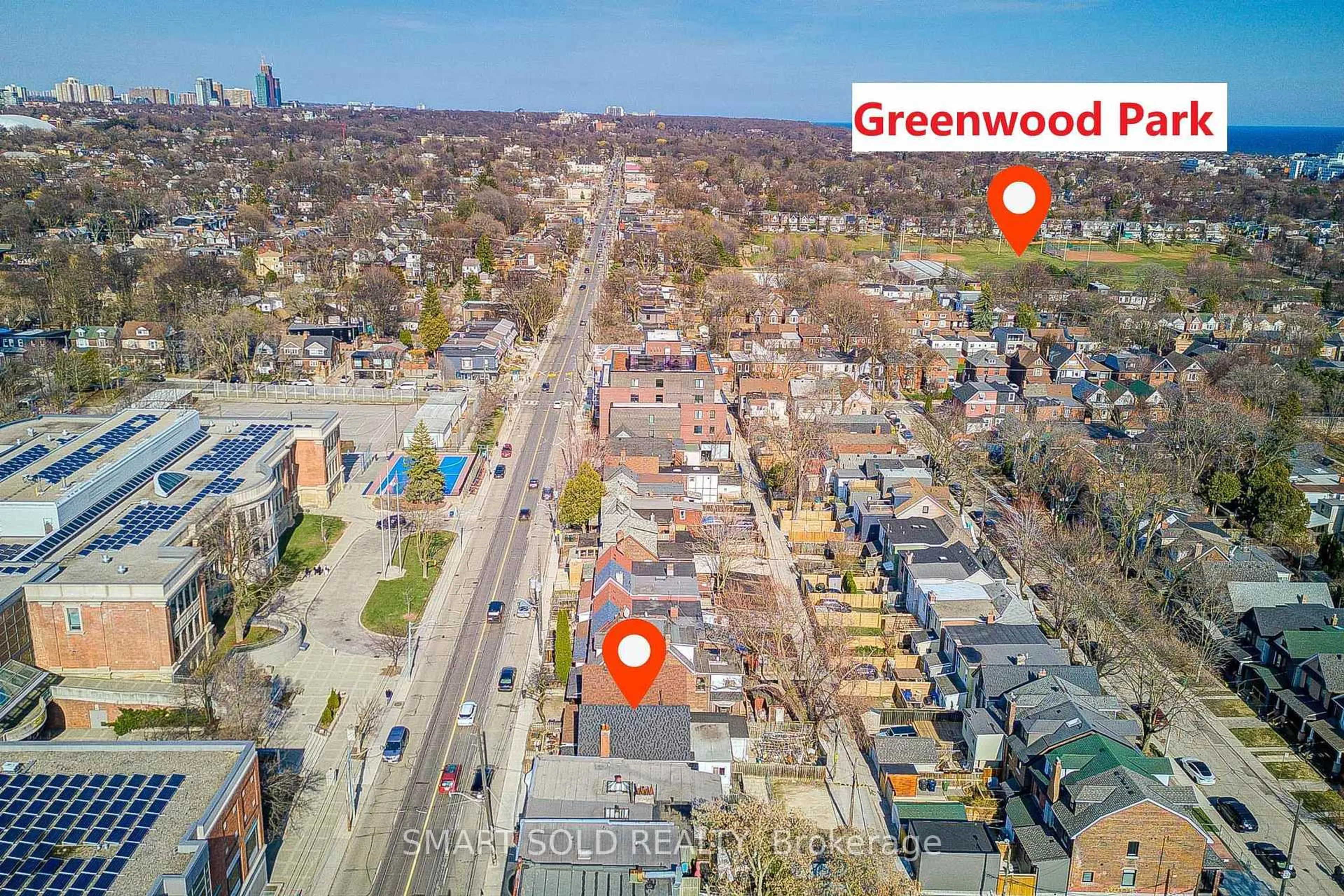 A pic from outside/outdoor area/front of a property/back of a property/a pic from drone, street for 1081 Gerrard St, Toronto Ontario M4M 1Z9