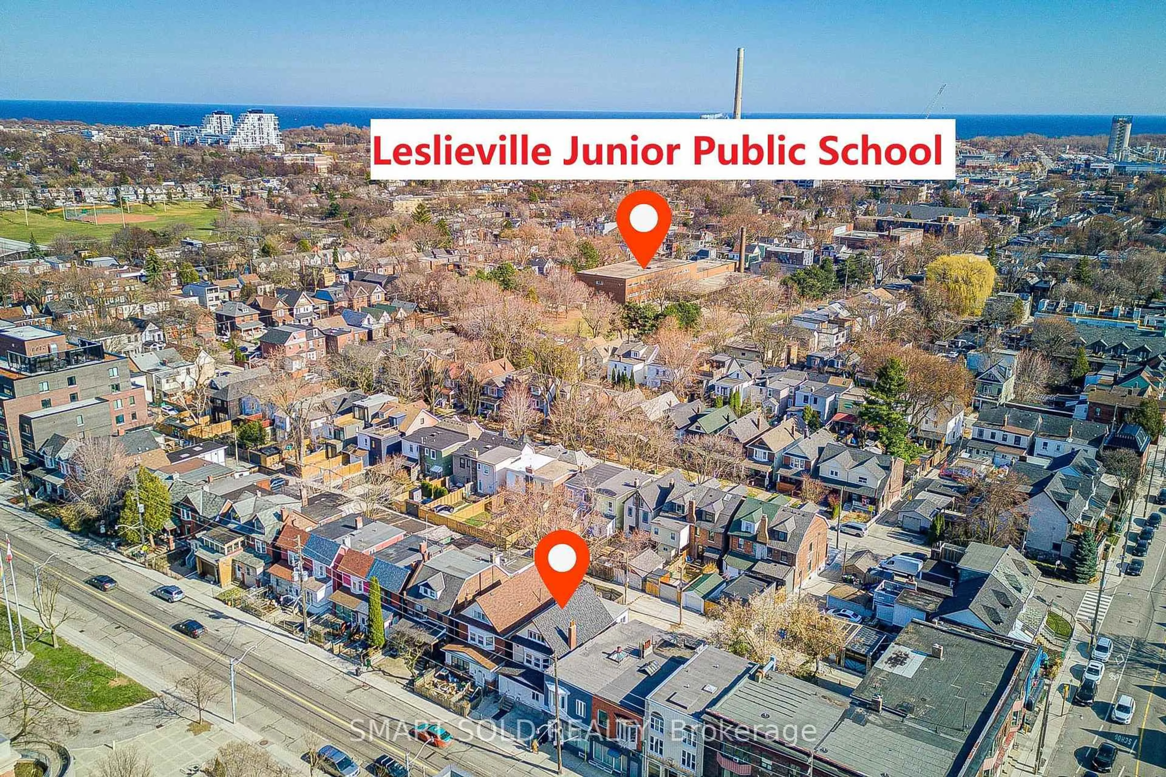 A pic from outside/outdoor area/front of a property/back of a property/a pic from drone, street for 1081 Gerrard St, Toronto Ontario M4M 1Z9