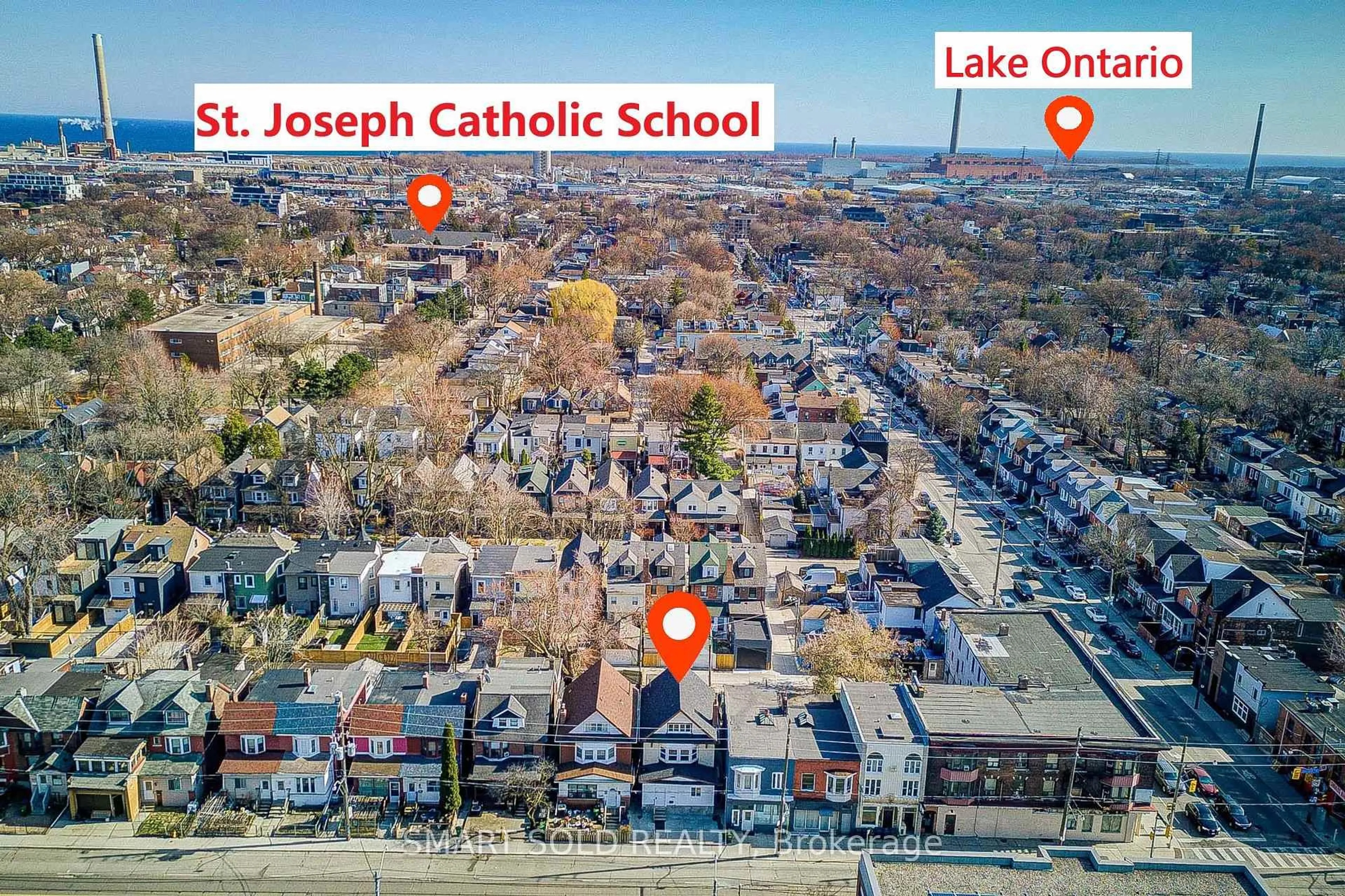 A pic from outside/outdoor area/front of a property/back of a property/a pic from drone, street for 1081 Gerrard St, Toronto Ontario M4M 1Z9