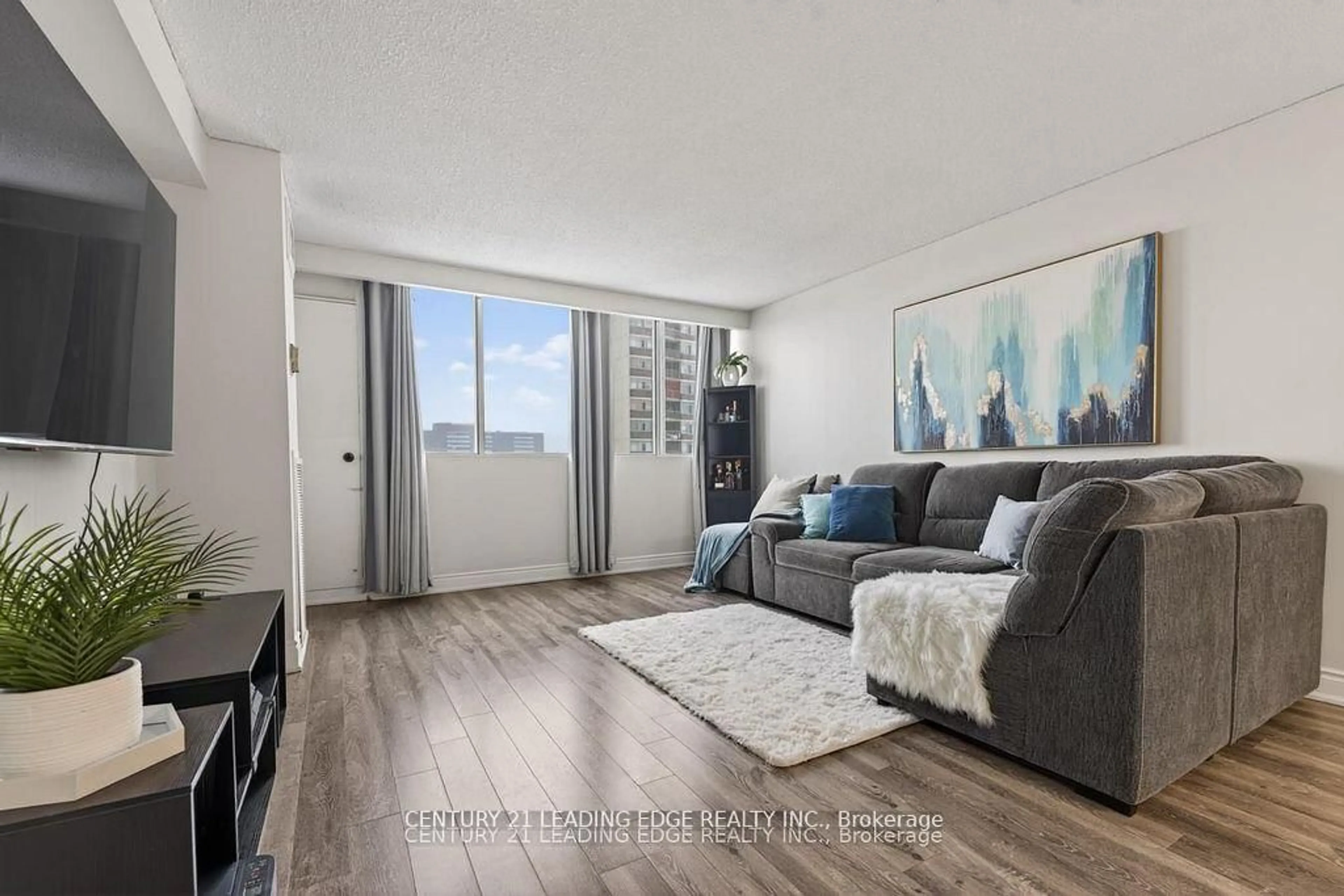 Living room with furniture, unknown for 40 Bay Mills Blvd #707, Toronto Ontario M1T 3P5