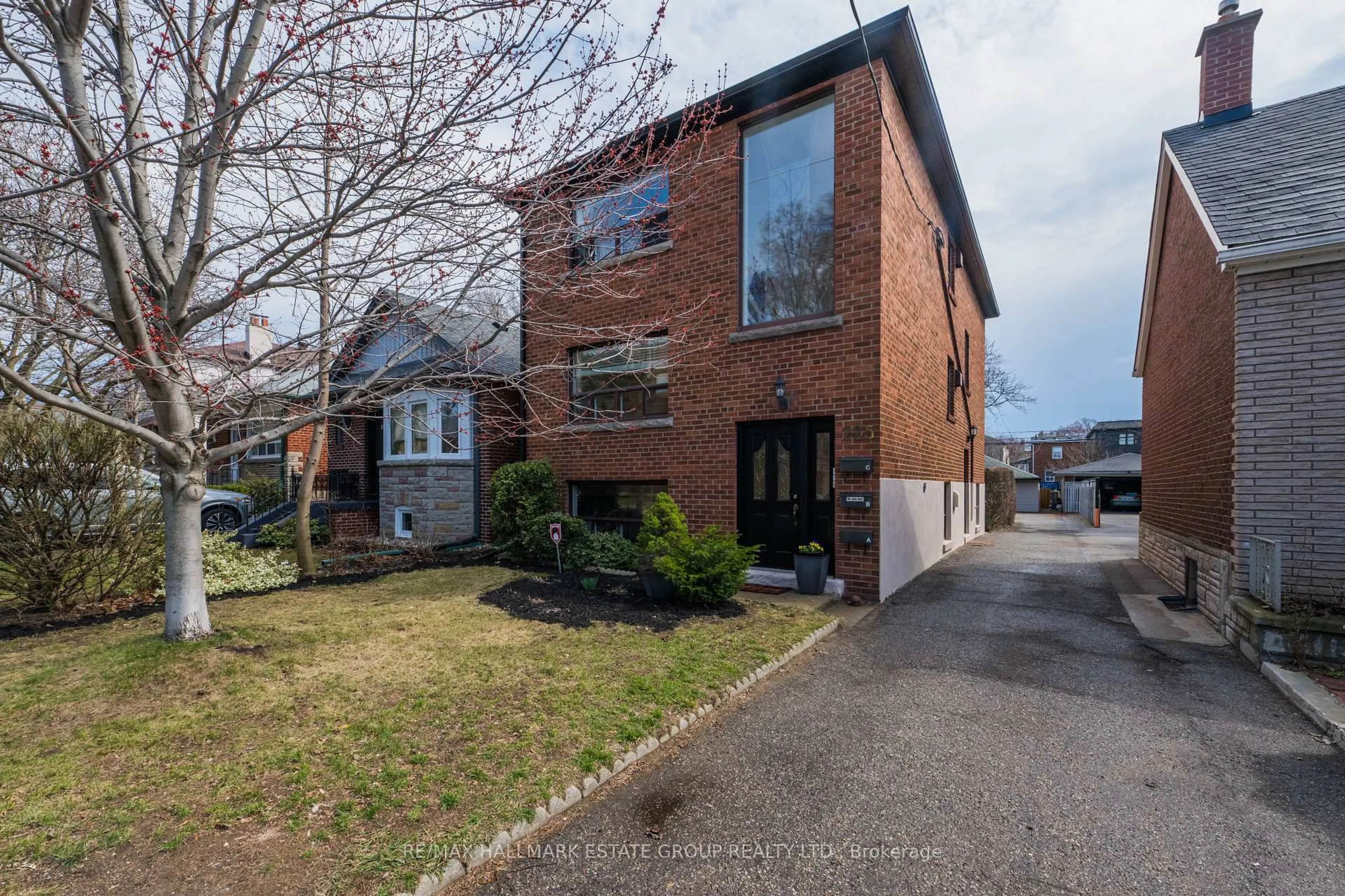 Home with brick exterior material, street for 225 Woodville Ave, Toronto Ontario M4J 2R4