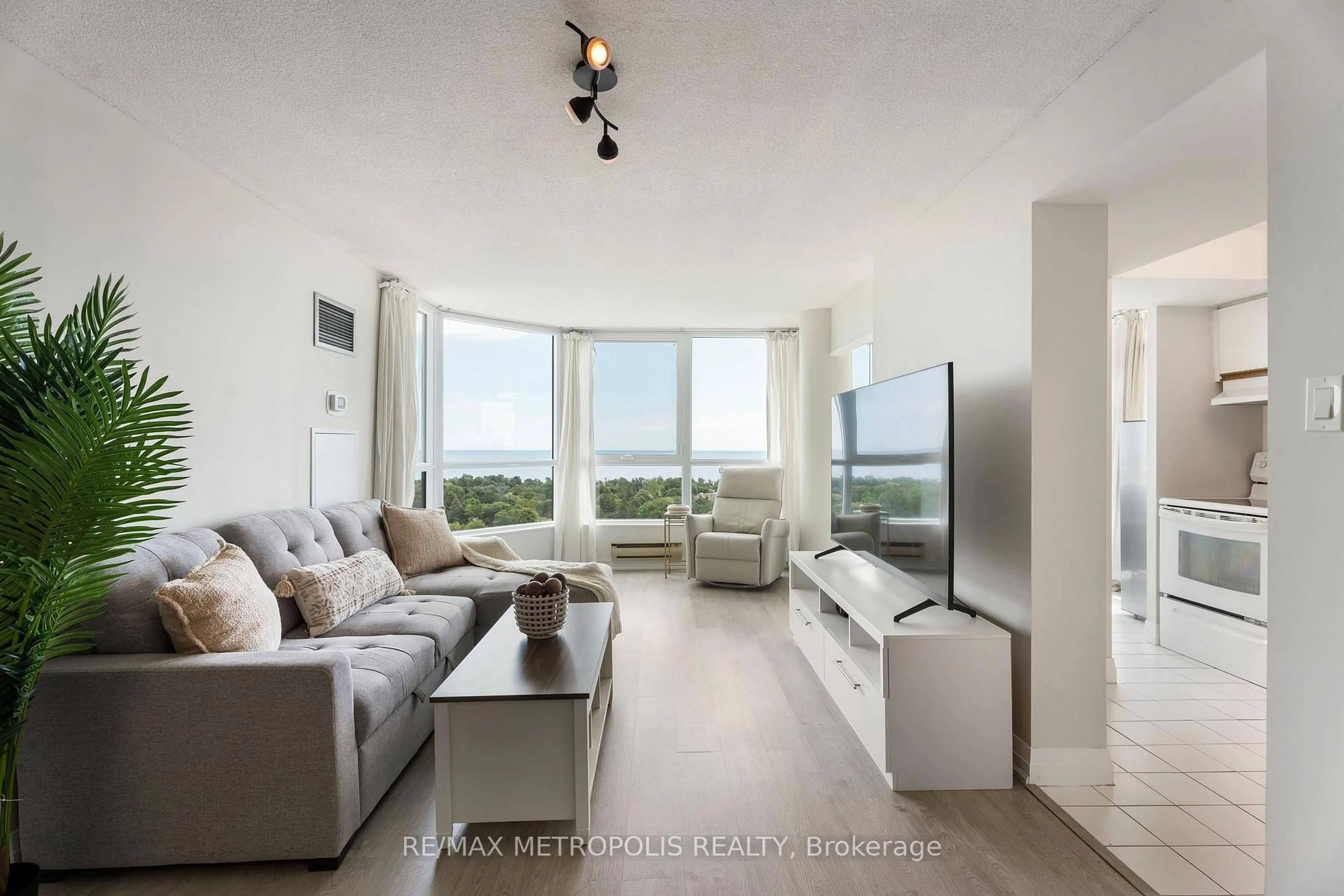 Living room with furniture, unknown for 3233 Eglinton Ave #1707, Toronto Ontario M1J 3N6