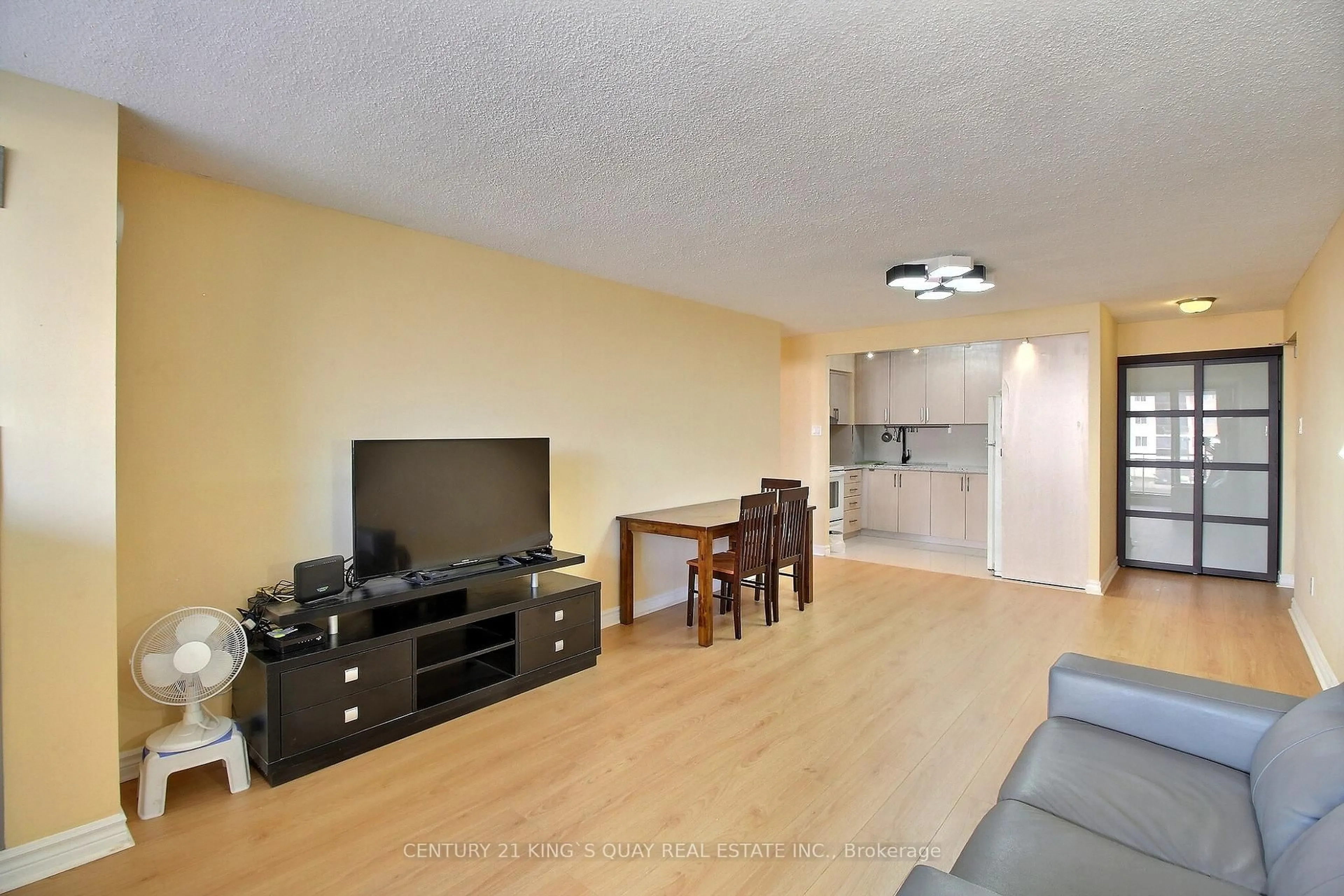 Living room with furniture, wood/laminate floor for 99 Blackwell Ave #202, Toronto Ontario M1B 3R5