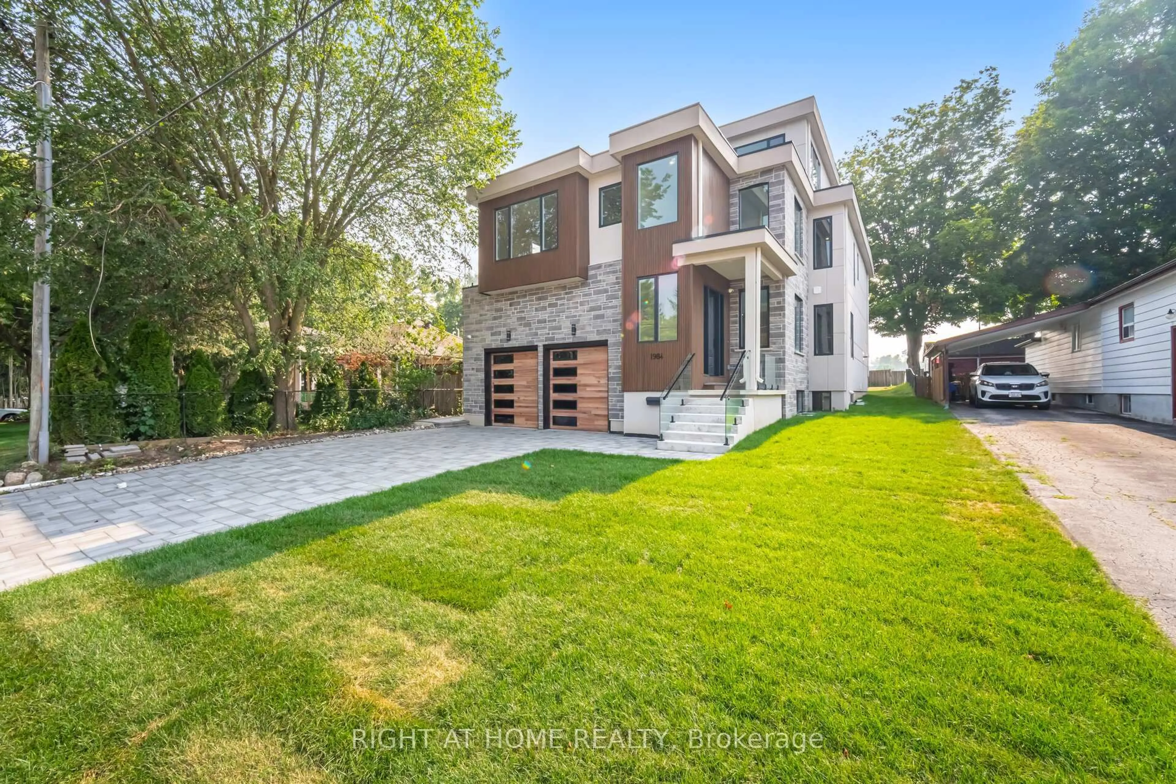 Home with brick exterior material, street for 1984 Guild Rd, Pickering Ontario L1V 1Y1