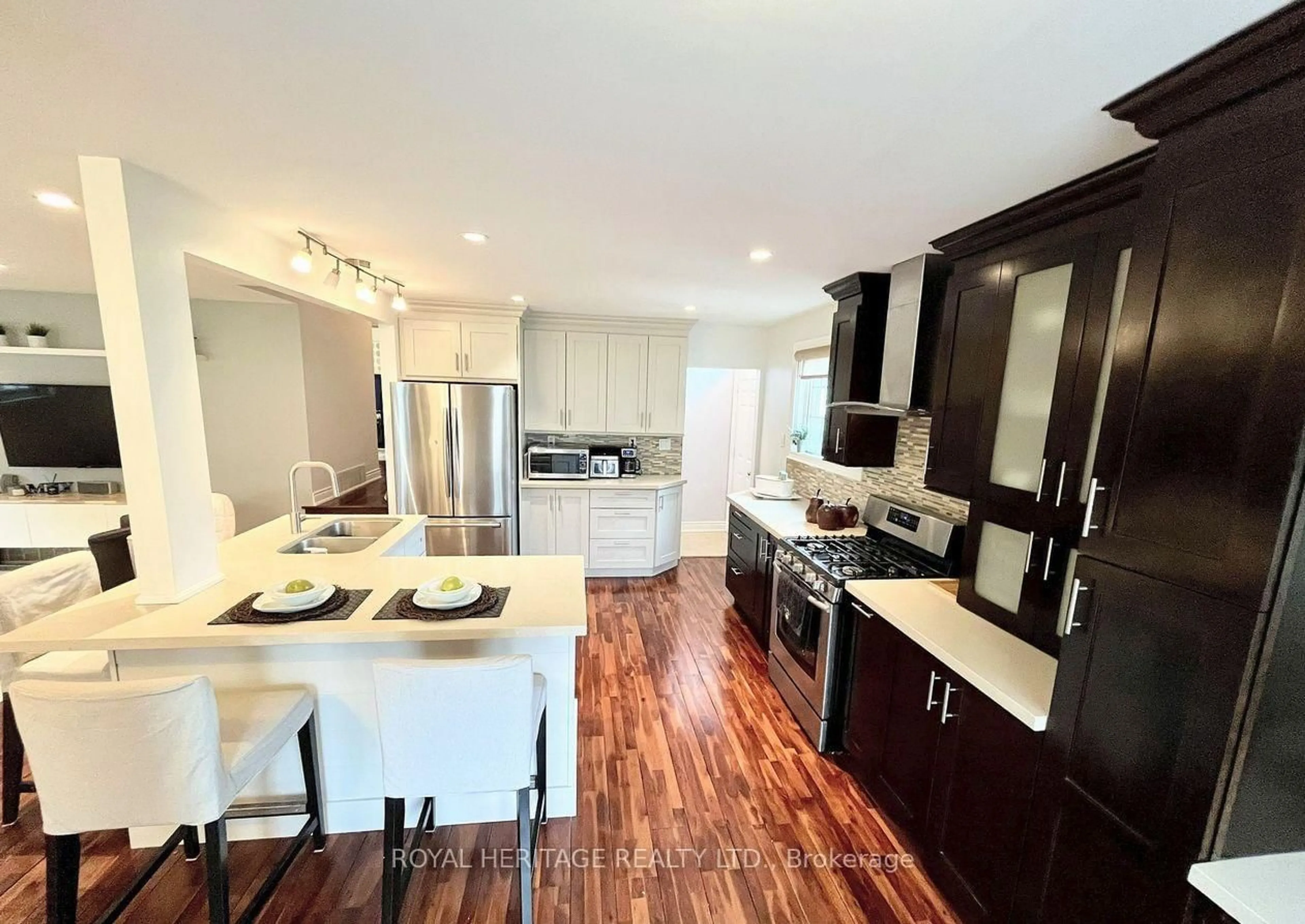Open concept kitchen, wood/laminate floor for 1398 Fordon Ave, Pickering Ontario L1W 1J9