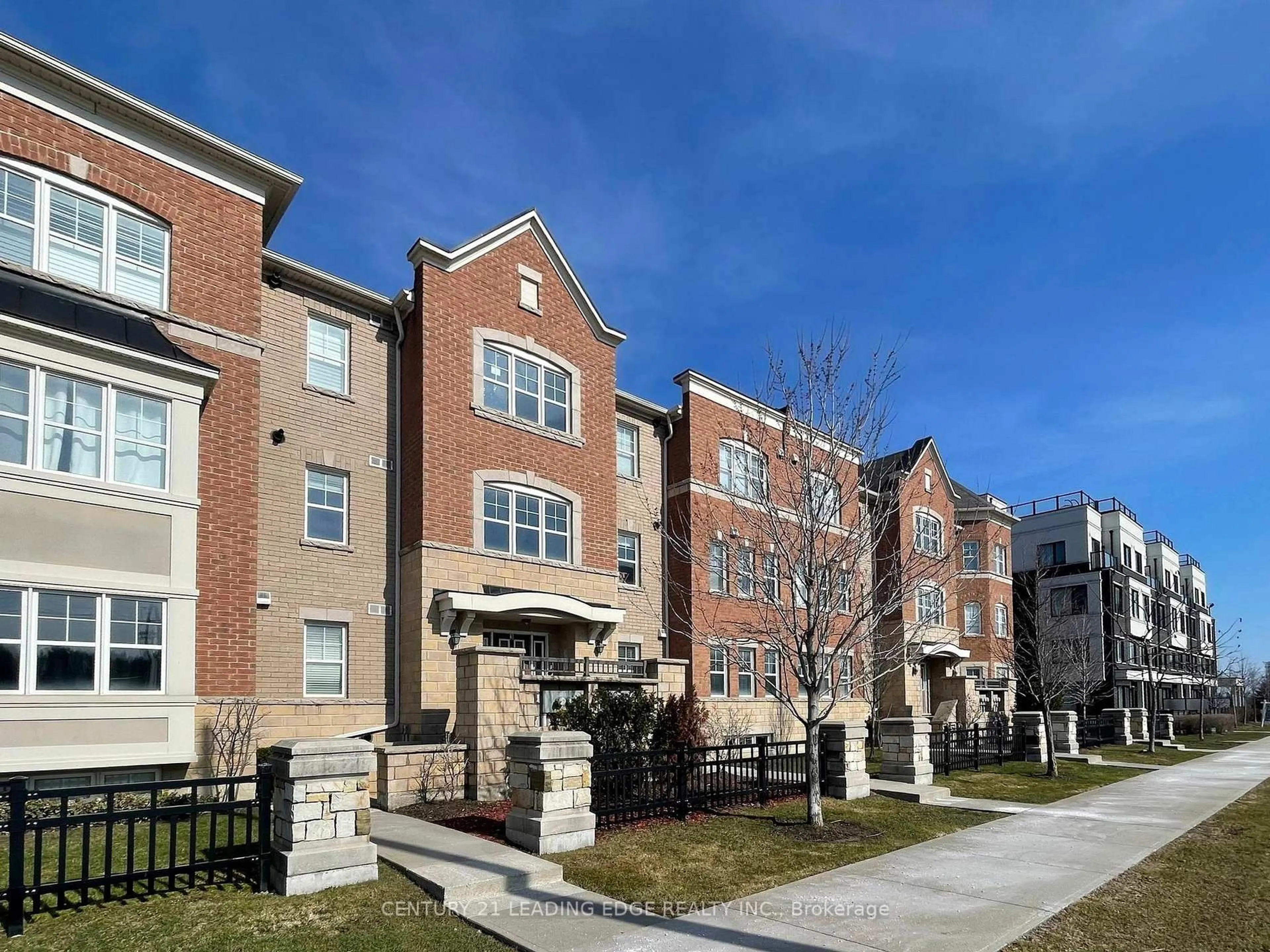 Home with brick exterior material, street for 1725 Pure Springs Blvd #106, Pickering Ontario L1X 0C4