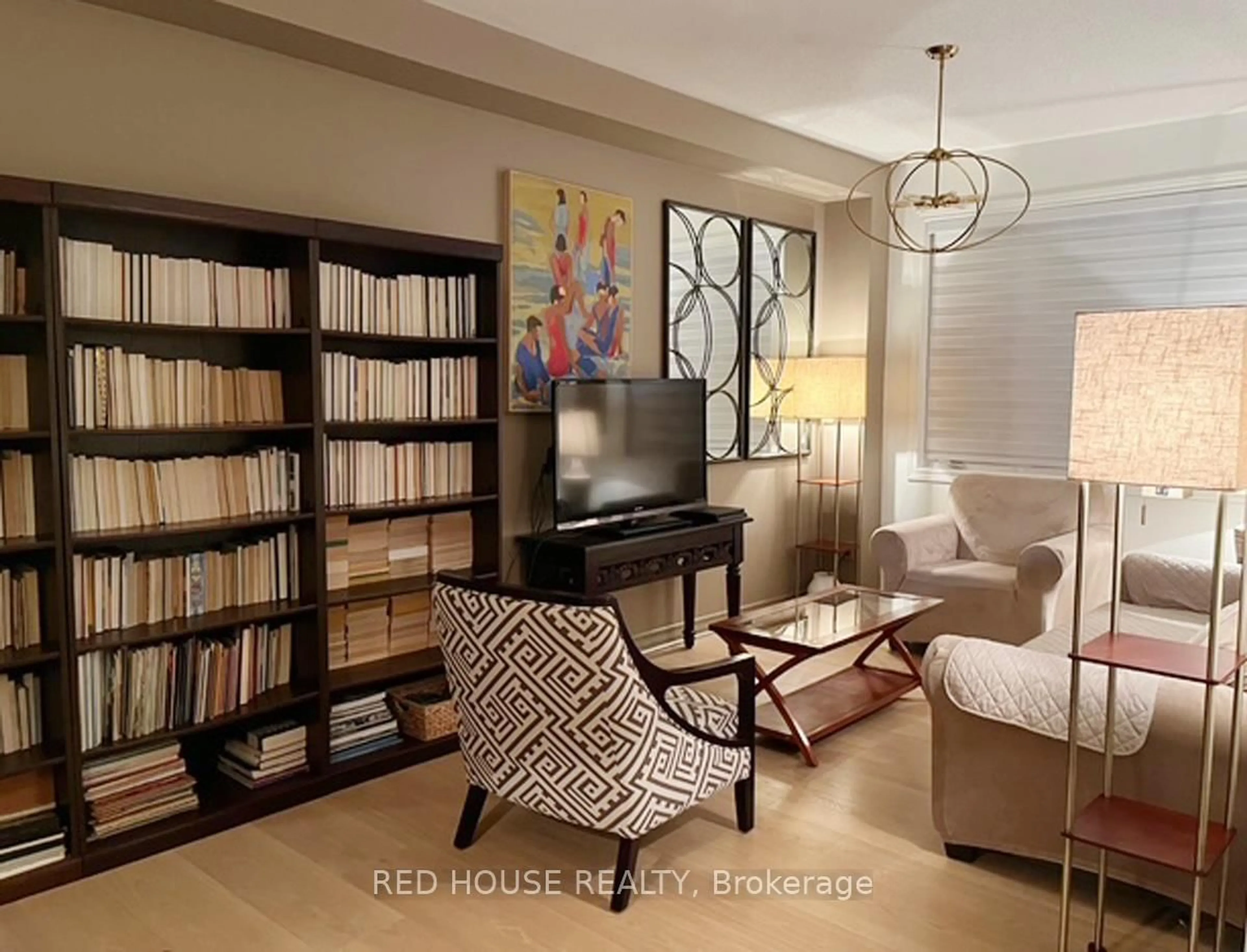 Living room with furniture, wood/laminate floor for 12 Naylor Lane, Ajax Ontario L1S 7S7