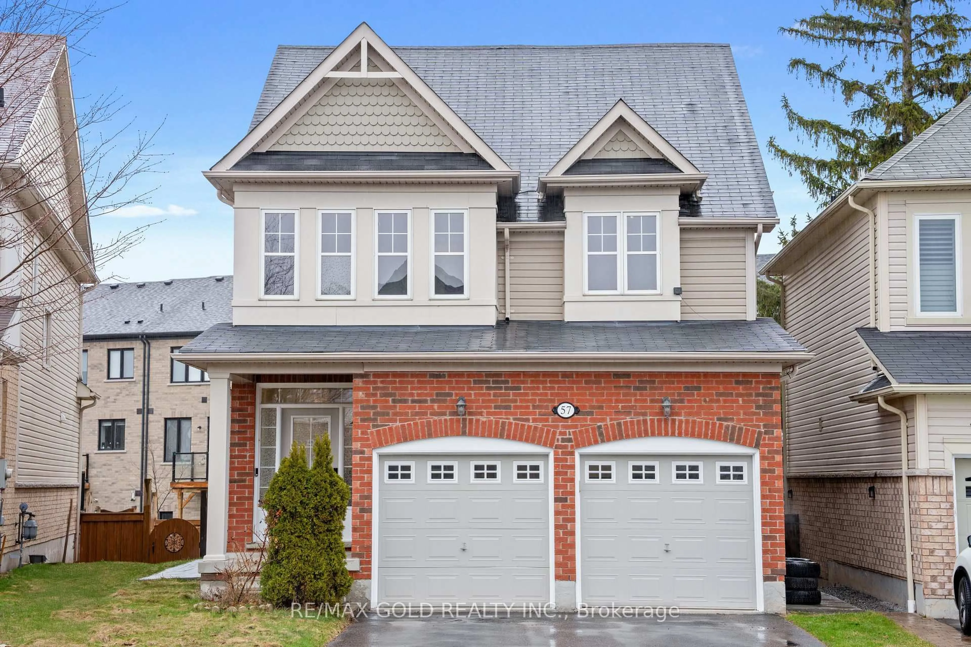 Home with brick exterior material, street for 57 James Govan Dr, Whitby Ontario L1N 0J9