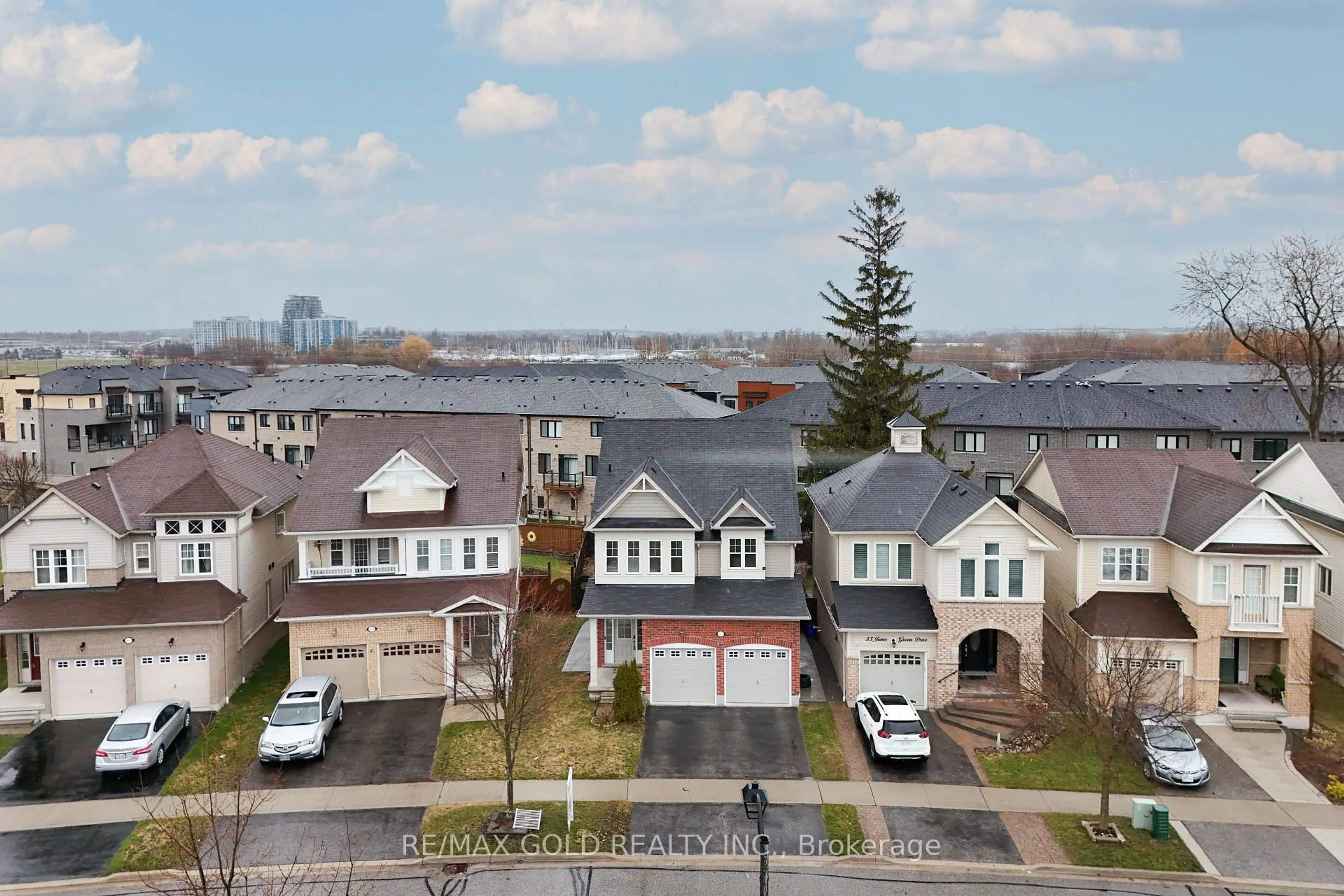 A pic from outside/outdoor area/front of a property/back of a property/a pic from drone, water/lake/river/ocean view for 57 James Govan Dr, Whitby Ontario L1N 0J9