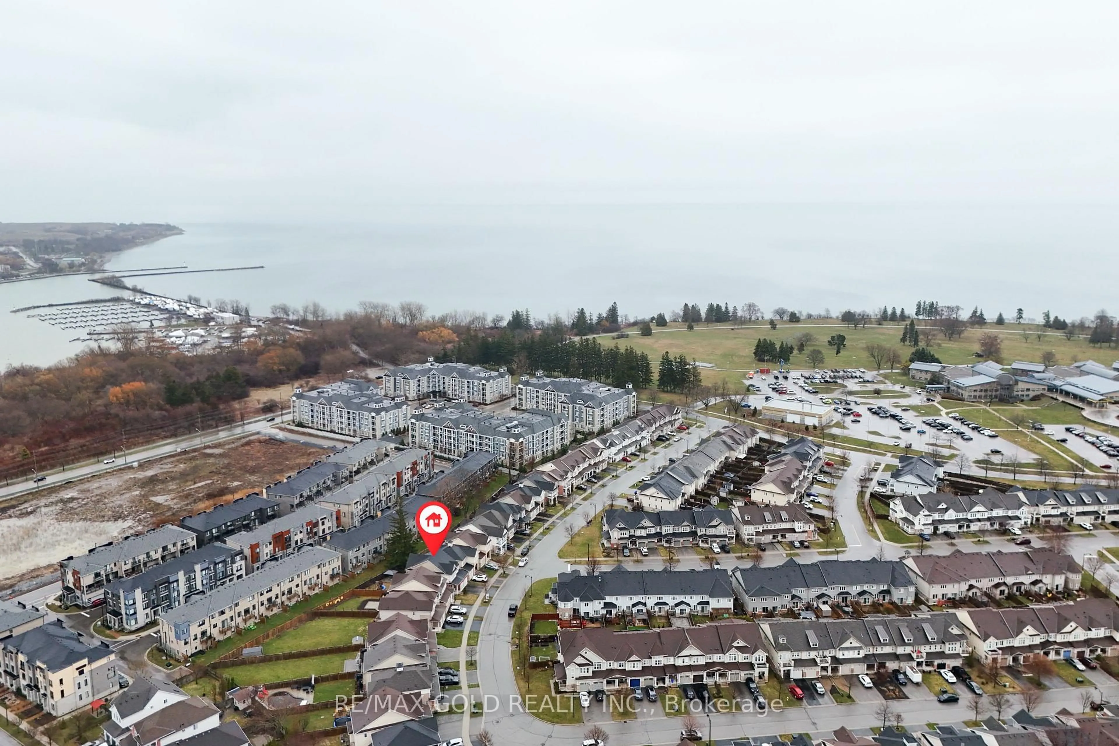 A pic from outside/outdoor area/front of a property/back of a property/a pic from drone, water/lake/river/ocean view for 57 James Govan Dr, Whitby Ontario L1N 0J9