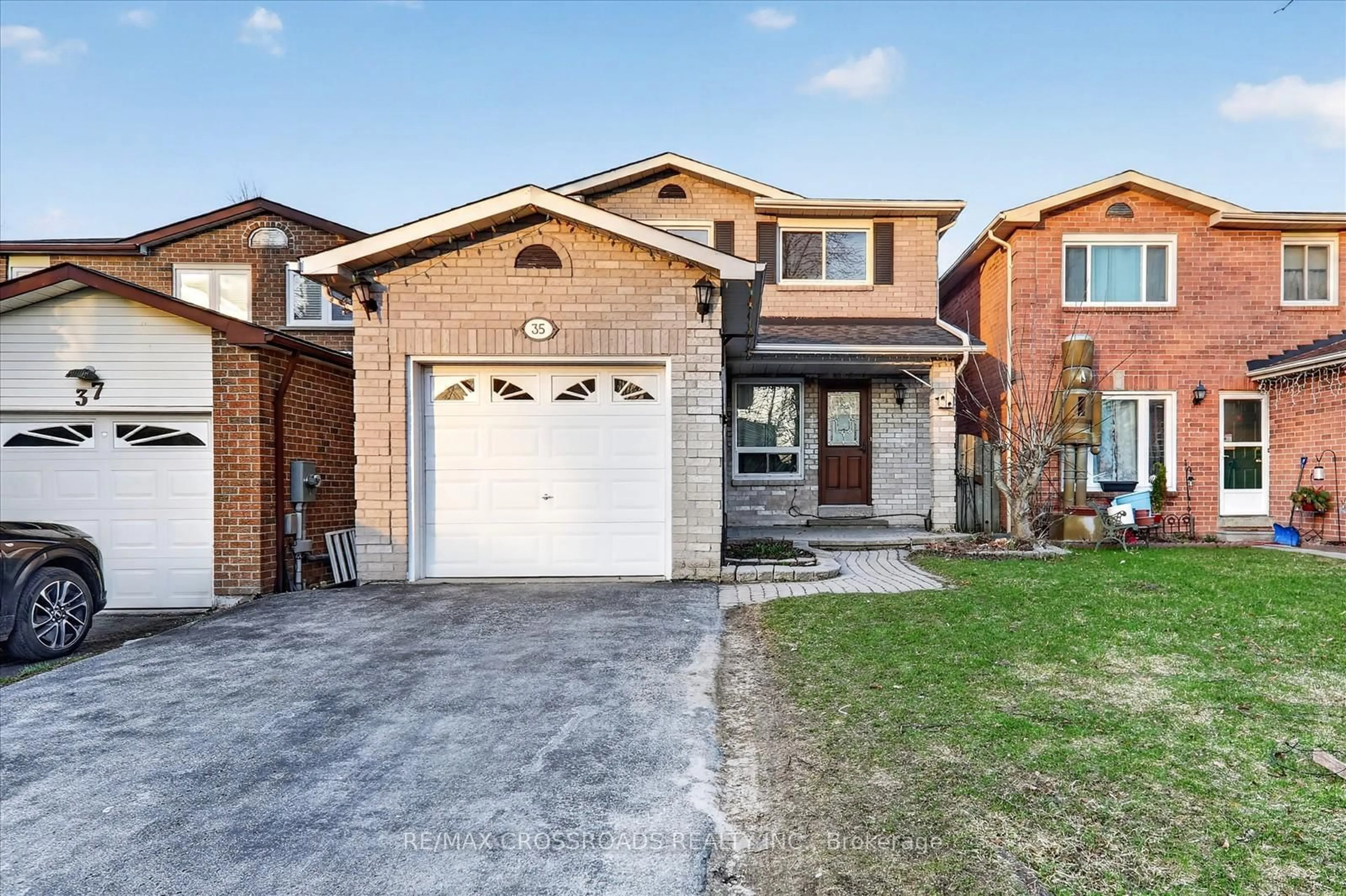 Home with brick exterior material, street for 35 Harley Dr, Ajax Ontario L1S 5X6